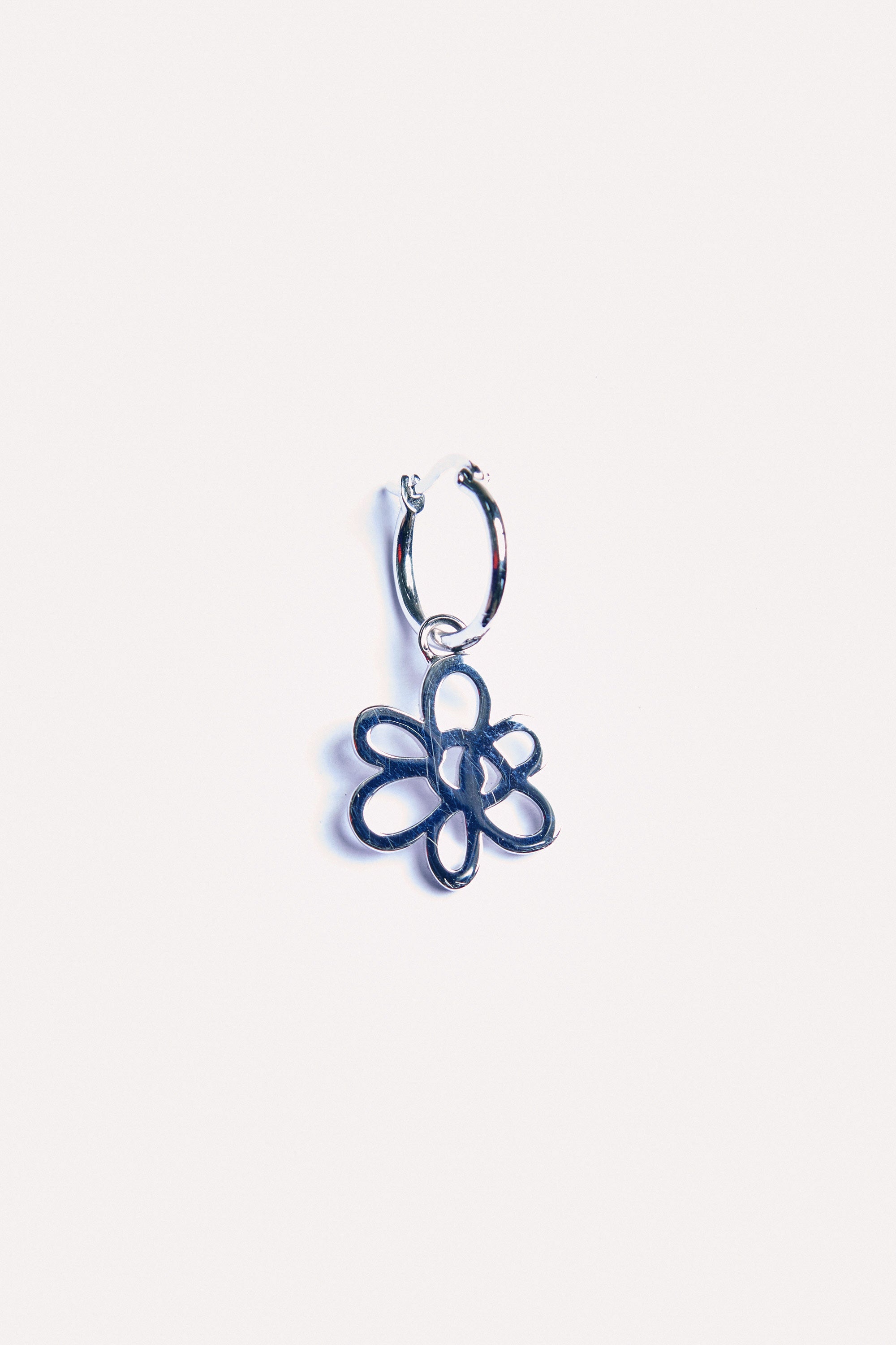 The OUTLINE GESTURE EARRING - SILVER available online with global shipping, and in PAM Stores Melbourne and Sydney.