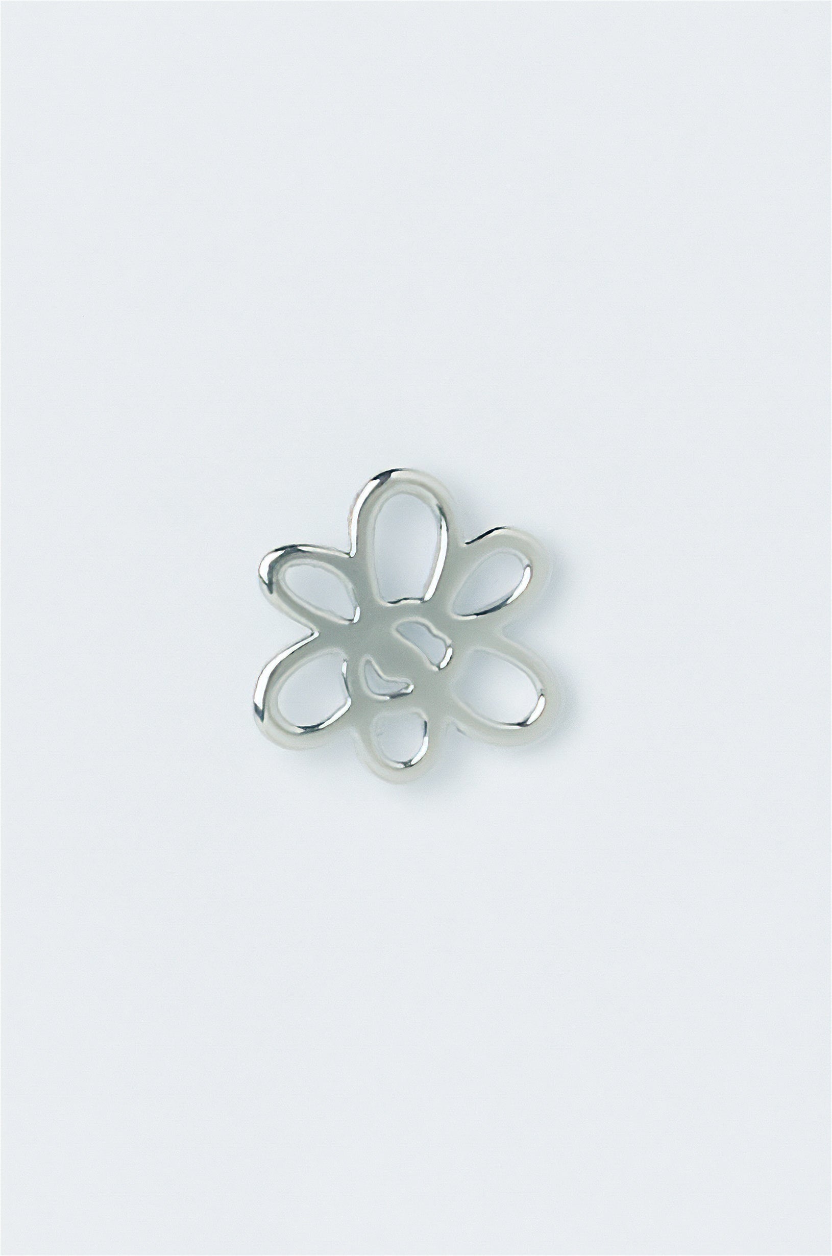 The OUTLINE GESTURE STUD - SILVER available online with global shipping, and in PAM Stores Melbourne and Sydney.