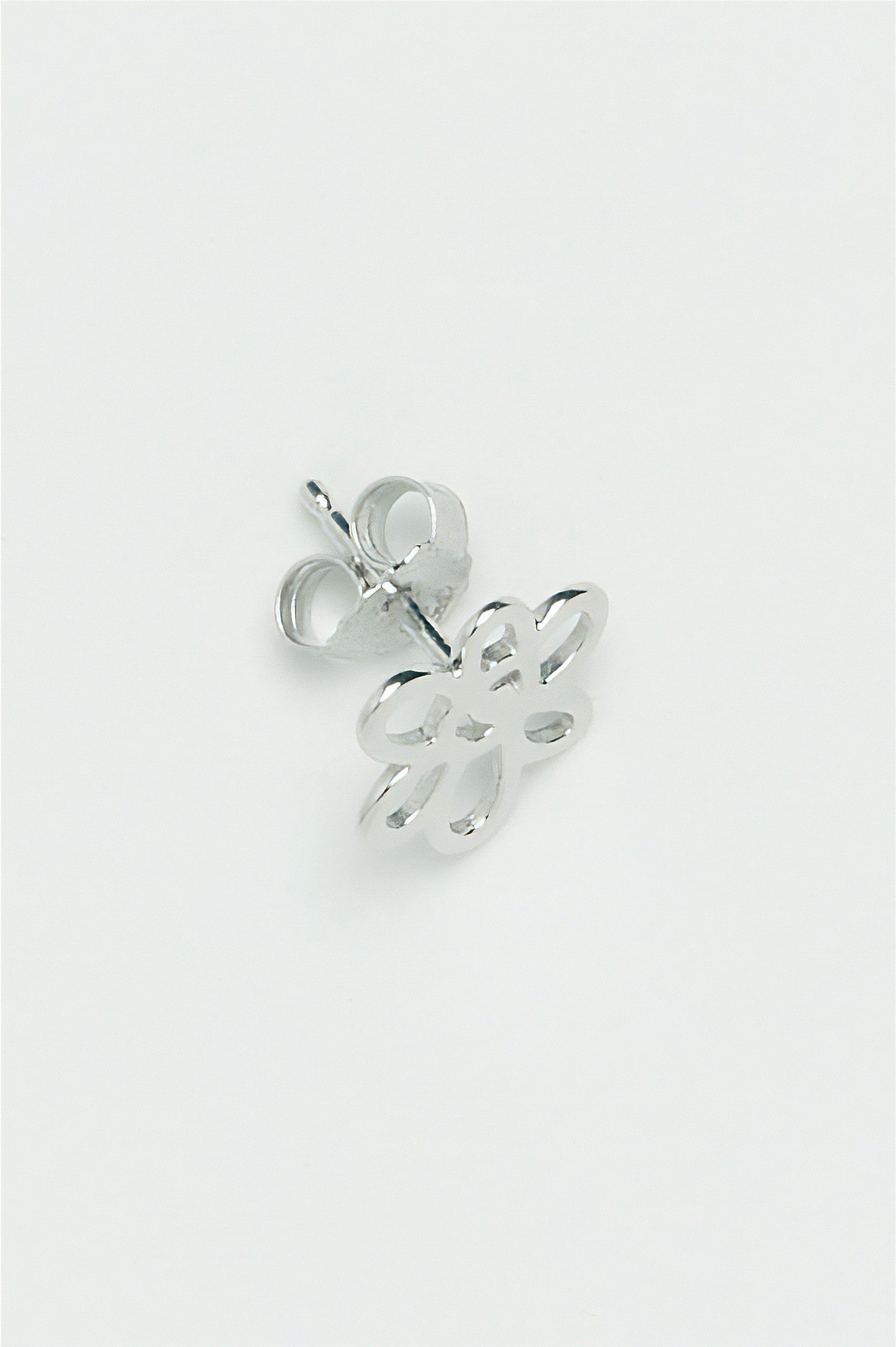 The OUTLINE GESTURE STUD - SILVER available online with global shipping, and in PAM Stores Melbourne and Sydney.