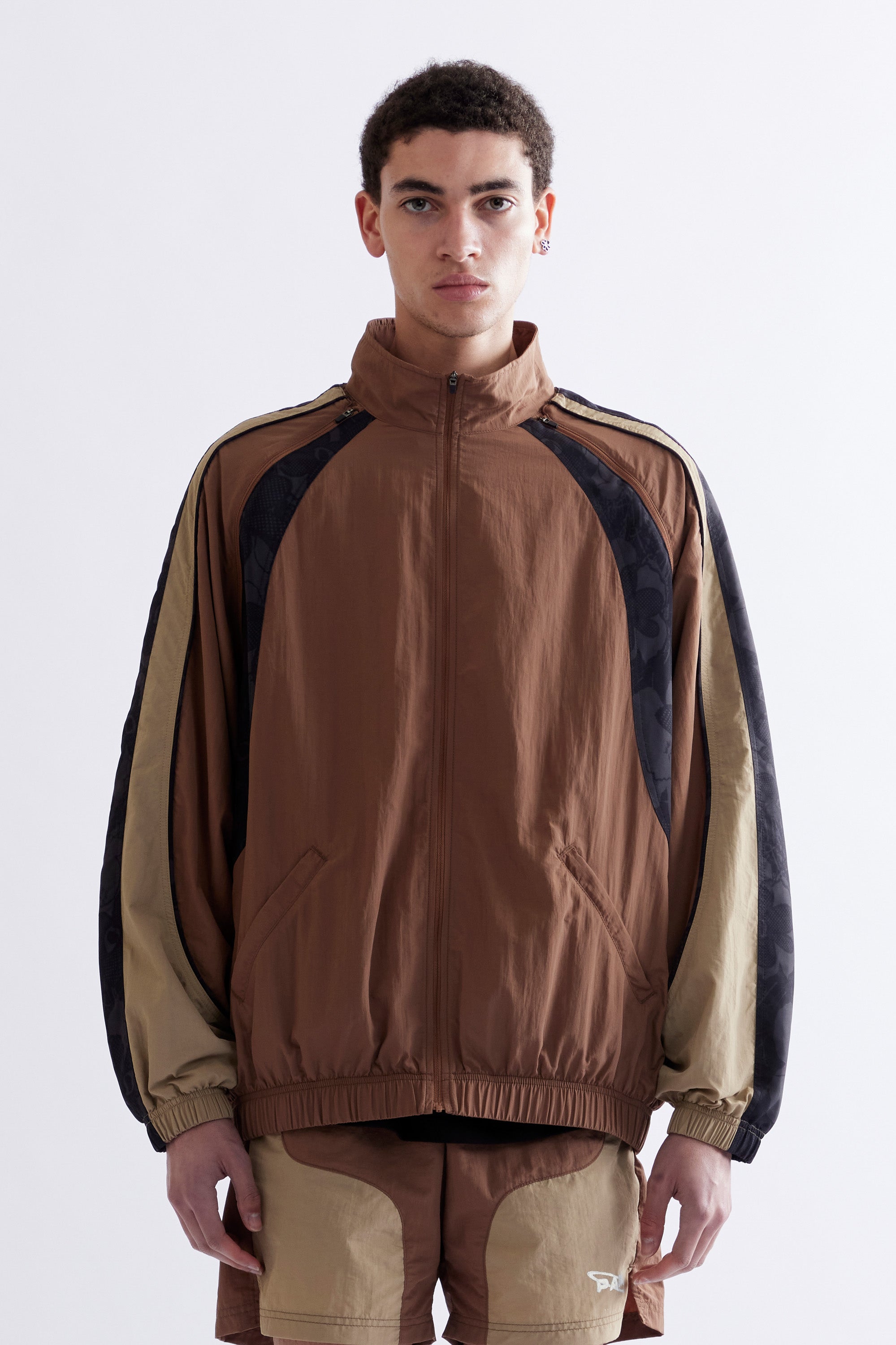 The LUNACY TRACKTION ZIP THRU TRACK JACKET available online with global shipping, and in PAM Stores Melbourne and Sydney.