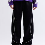 The MIRAGE TRACK PANT - BLACK available online with global shipping, and in PAM Stores Melbourne and Sydney.