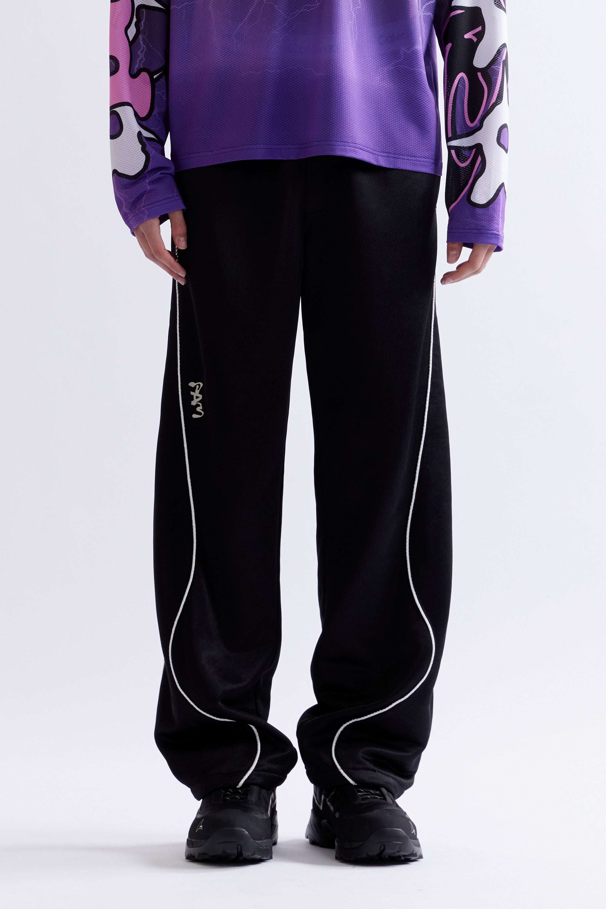 The MIRAGE TRACK PANT - BLACK available online with global shipping, and in PAM Stores Melbourne and Sydney.