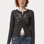 The KOSMIC KISS ZIPPED CARDIGAN available online with global shipping, and in PAM Stores Melbourne and Sydney.