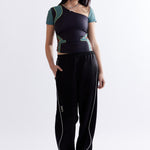 The MIRAGE TRACK PANT - BLACK available online with global shipping, and in PAM Stores Melbourne and Sydney.