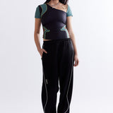 The MIRAGE TRACK PANT - BLACK available online with global shipping, and in PAM Stores Melbourne and Sydney.