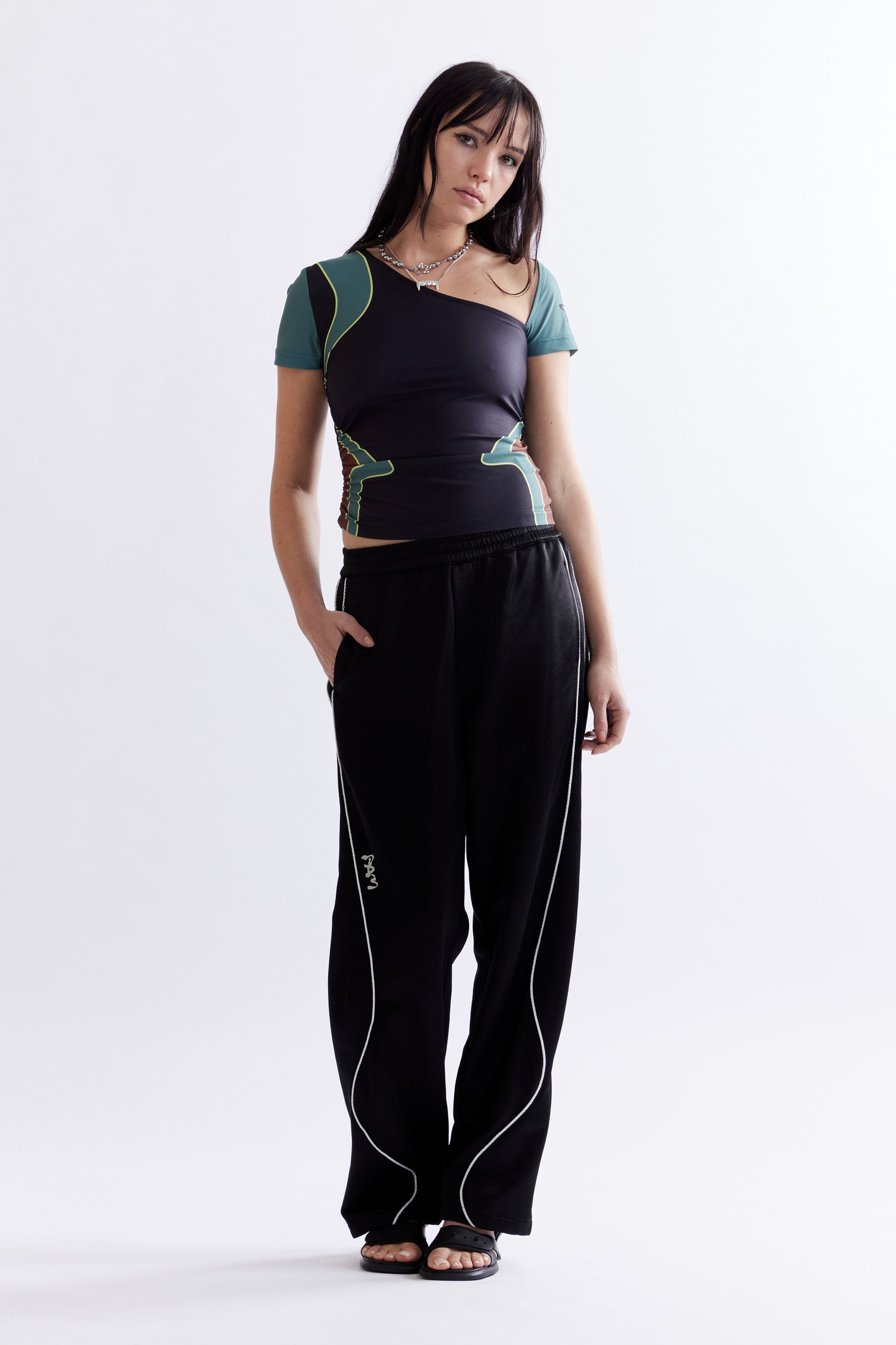 The MIRAGE TRACK PANT - BLACK available online with global shipping, and in PAM Stores Melbourne and Sydney.