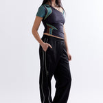 The MIRAGE TRACK PANT - BLACK available online with global shipping, and in PAM Stores Melbourne and Sydney.