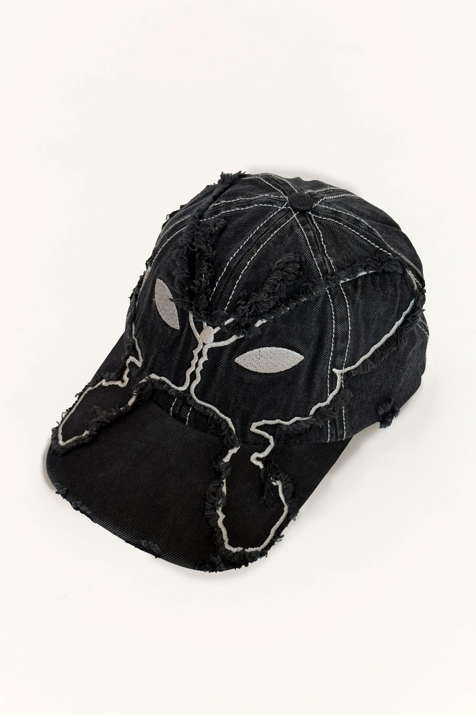 The ALIEN KISS FRAYING BASEBALL CAP available online with global shipping, and in PAM Stores Melbourne and Sydney.