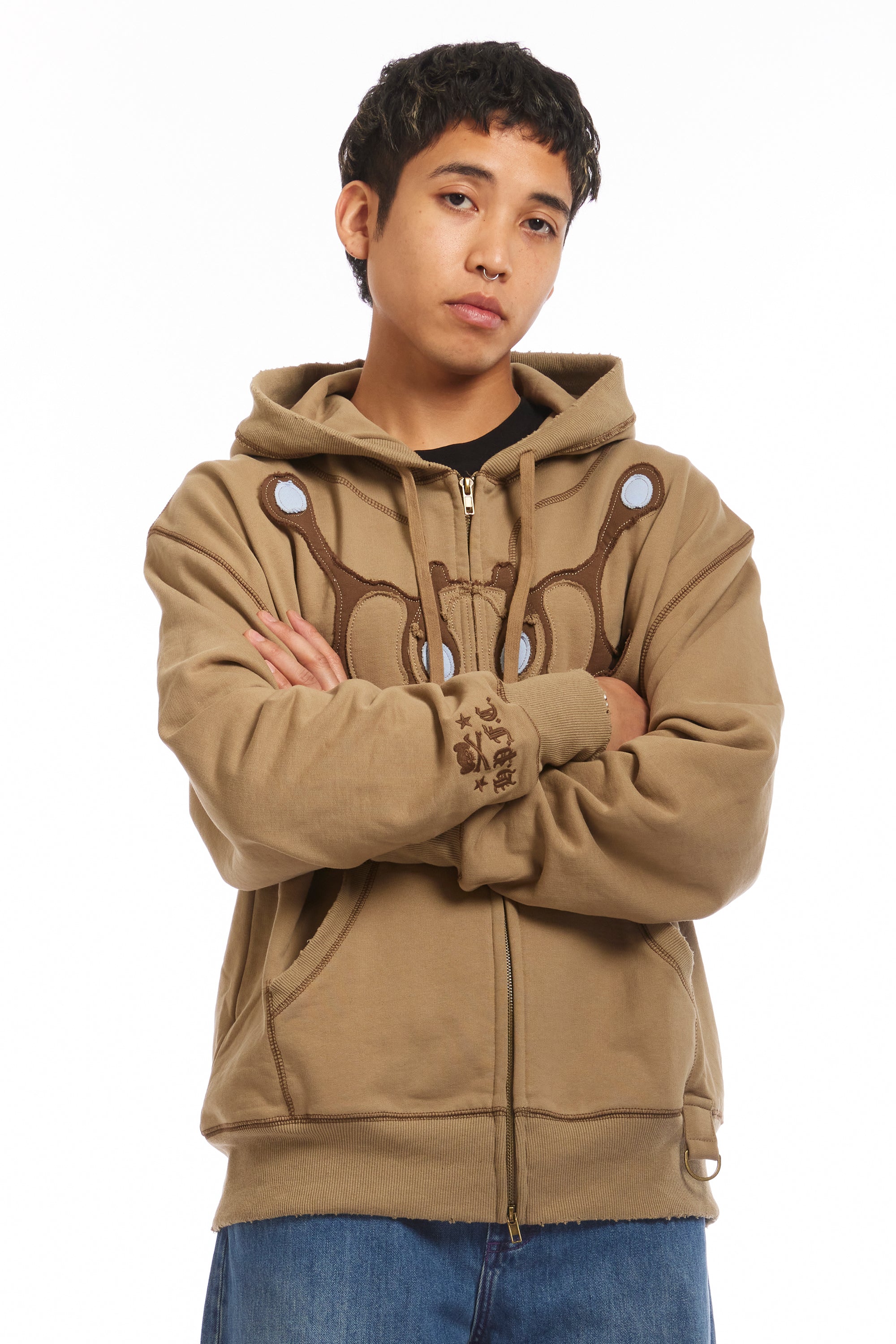 The Angel99 Zip Hoodie Beige available online with global shipping, and in PAM Stores Melbourne and Sydney.