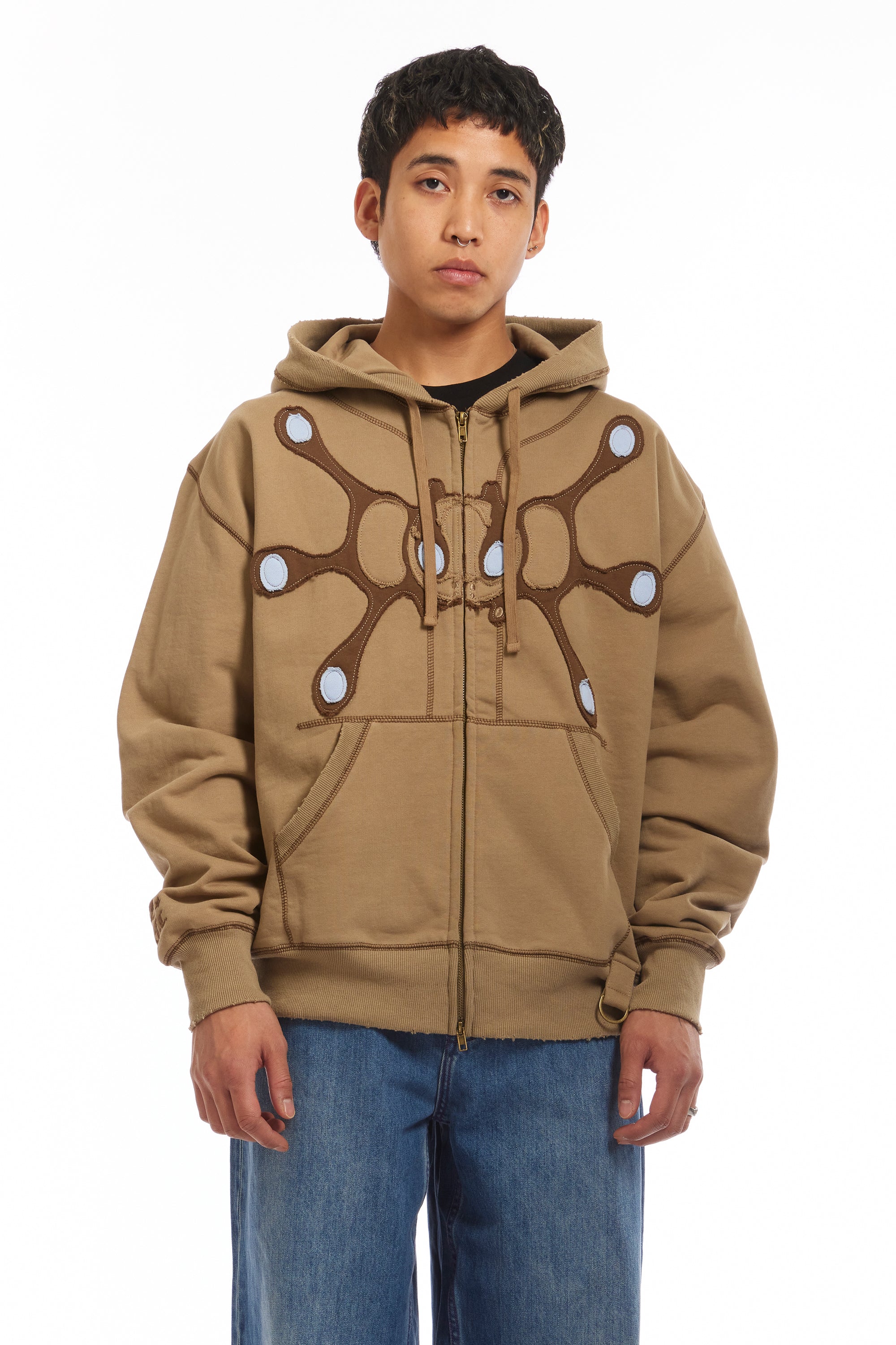 The Angel99 Zip Hoodie Beige available online with global shipping, and in PAM Stores Melbourne and Sydney.