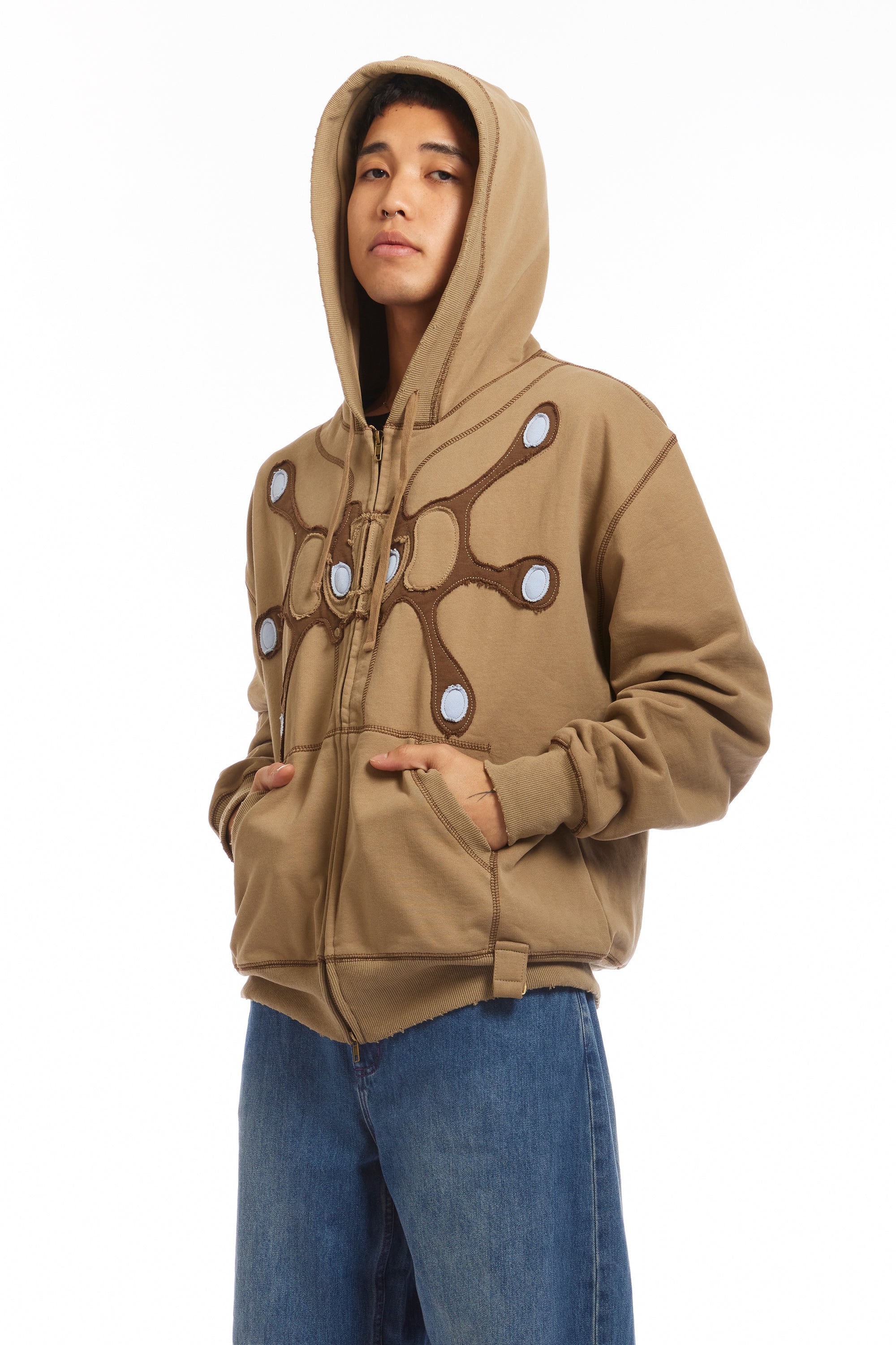 The Angel99 Zip Hoodie Beige available online with global shipping, and in PAM Stores Melbourne and Sydney.