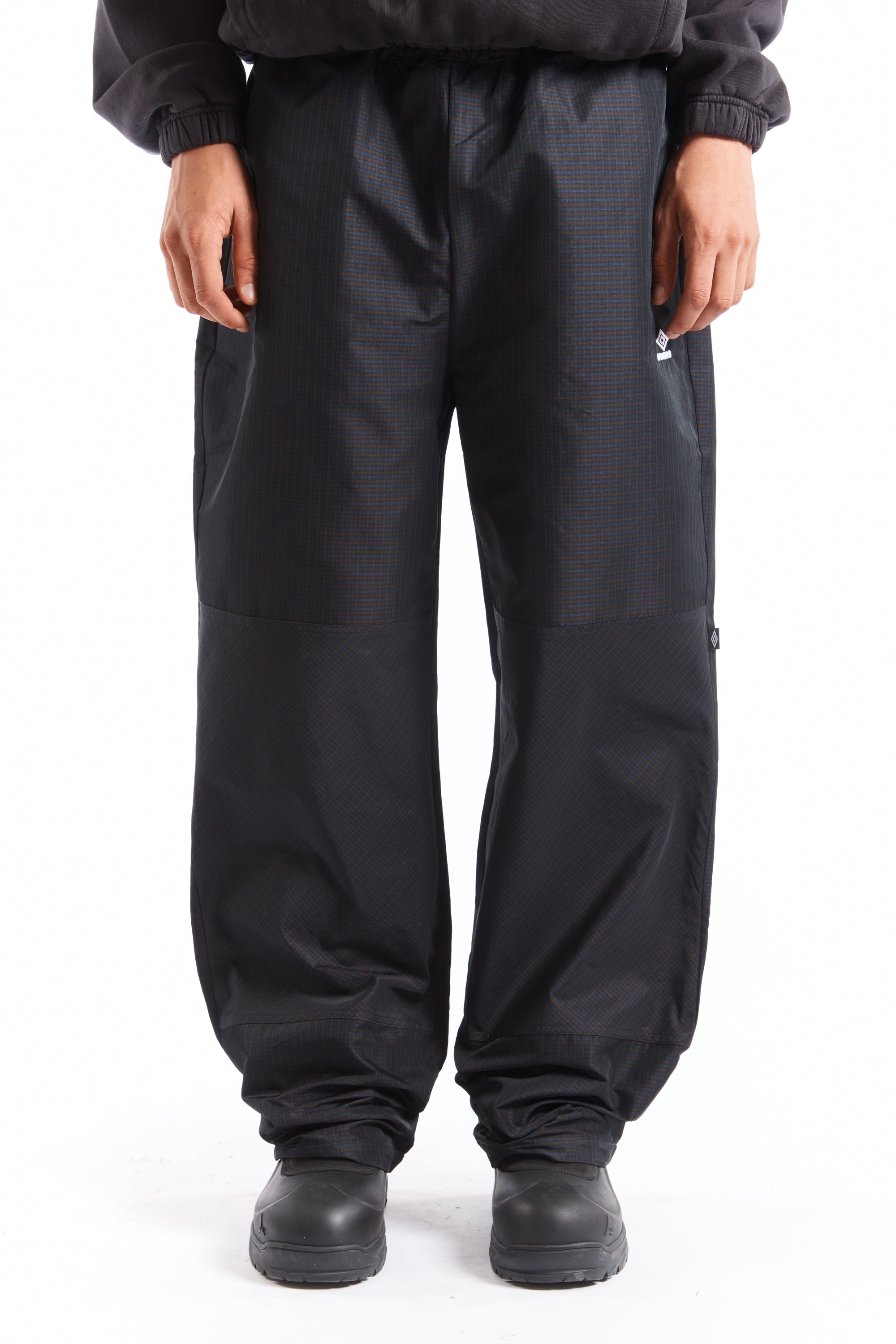 The Check Track Pants Navy Dark Brown available online with global shipping, and in PAM Stores Melbourne and Sydney.
