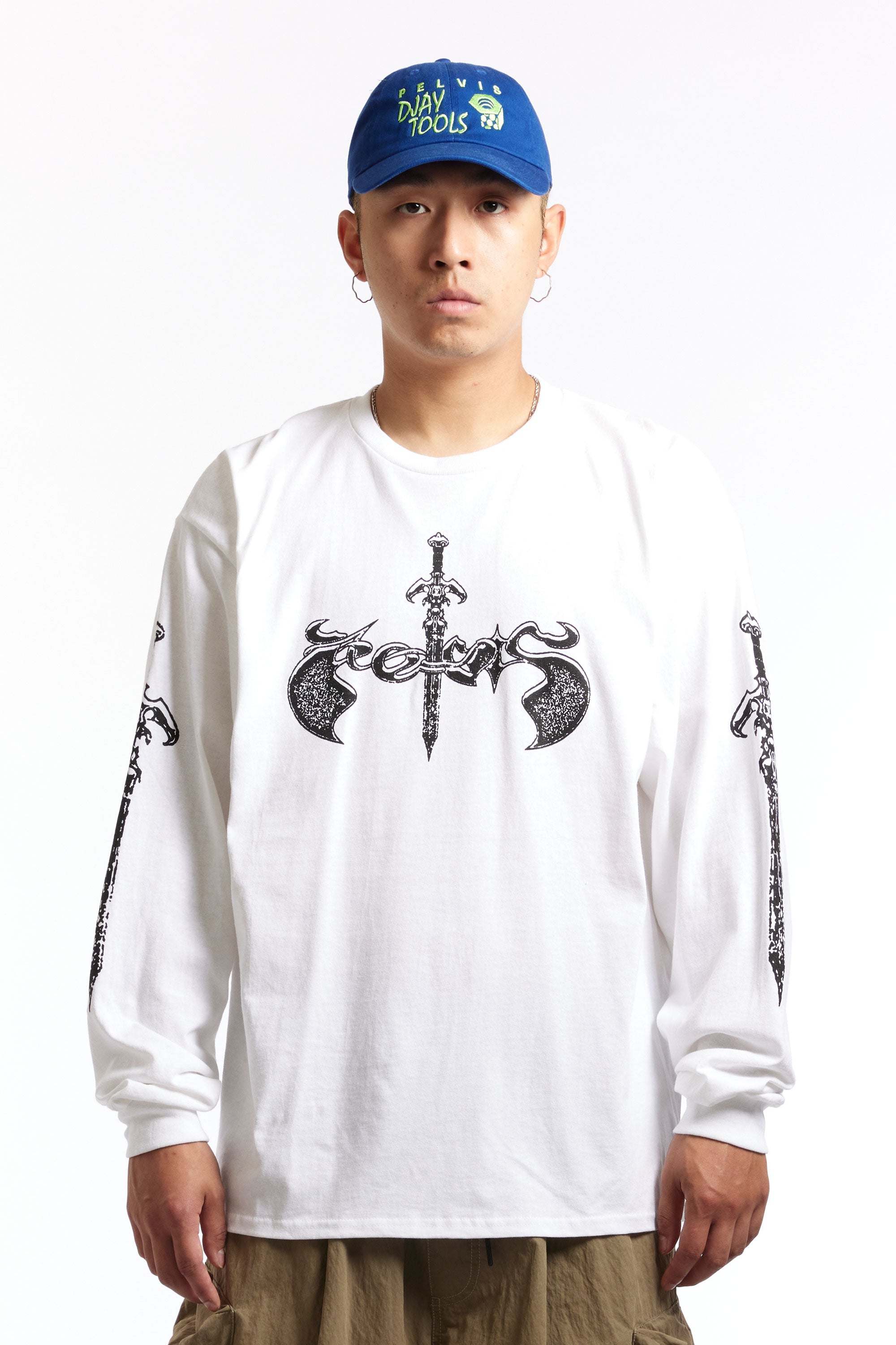 The PELVIS - DAGGER LS TEE WHITE available online with global shipping, and in PAM Stores Melbourne and Sydney.