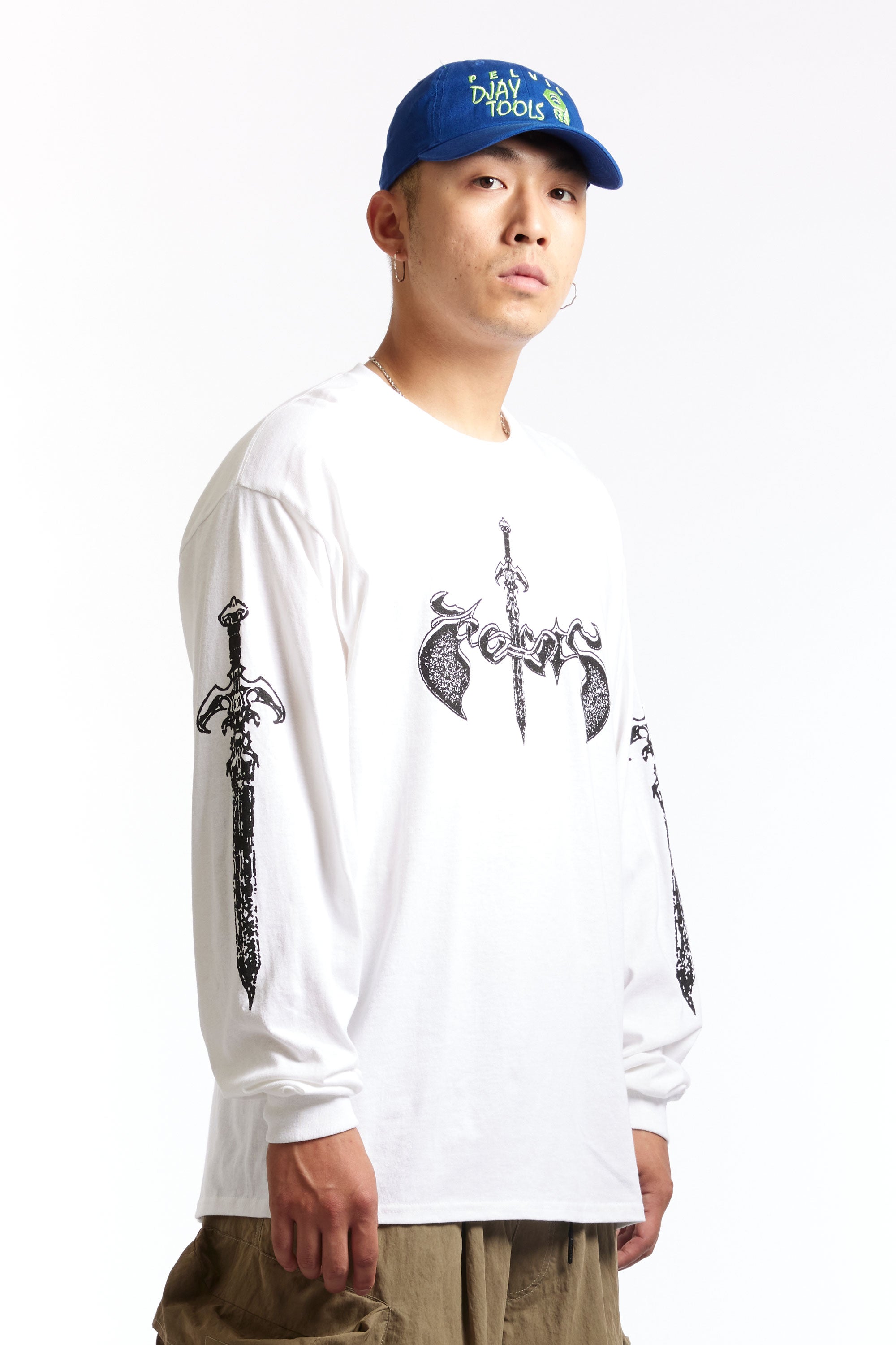 The PELVIS - DAGGER LS TEE  available online with global shipping, and in PAM Stores Melbourne and Sydney.