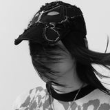 The ALIEN KISS FRAYING BASEBALL CAP available online with global shipping, and in PAM Stores Melbourne and Sydney.