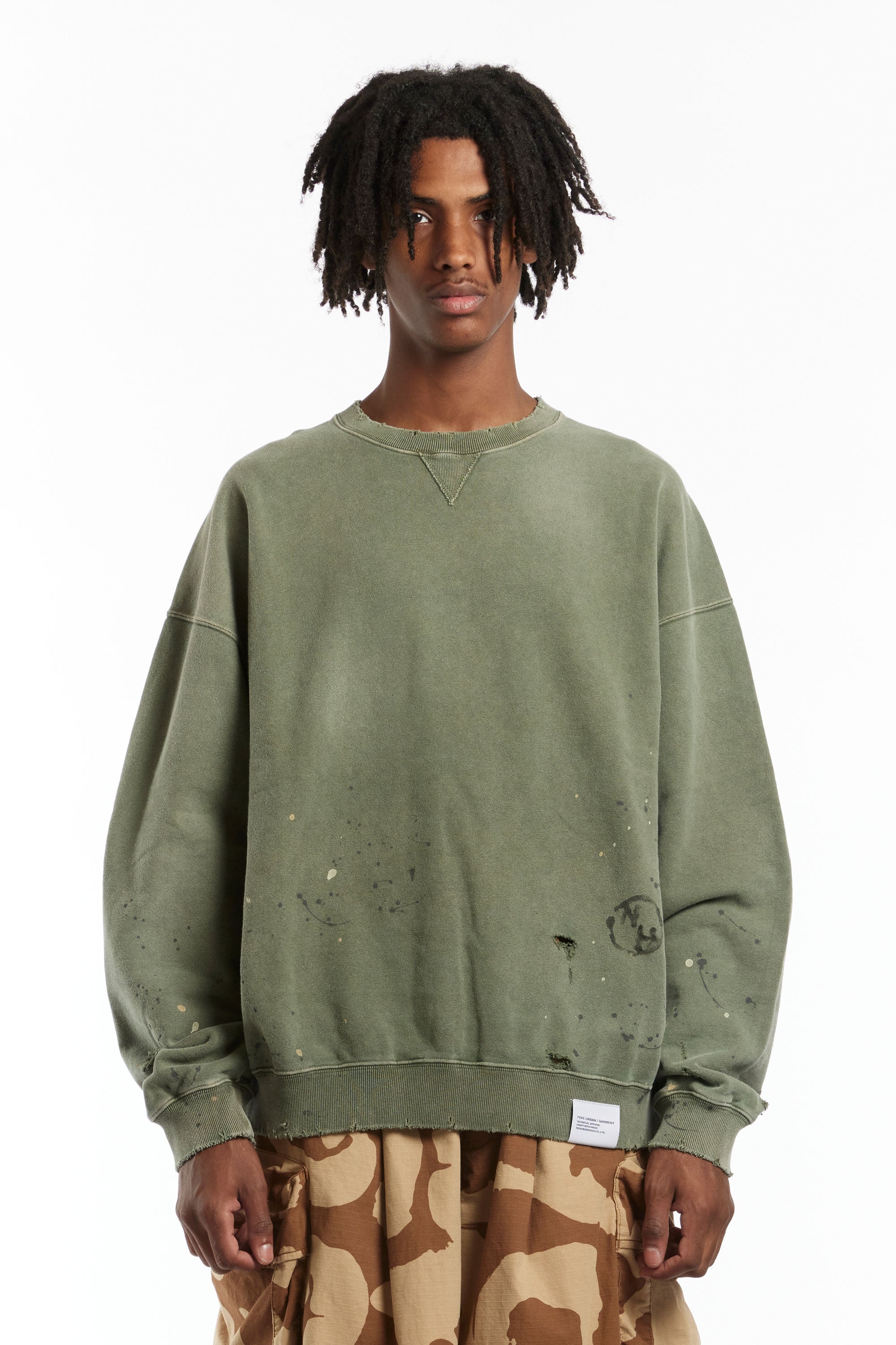 The NEIGHBORHOOD - DAMAGE SWEATSHIRT OLIVE DRAB available online with global shipping, and in PAM Stores Melbourne and Sydney.