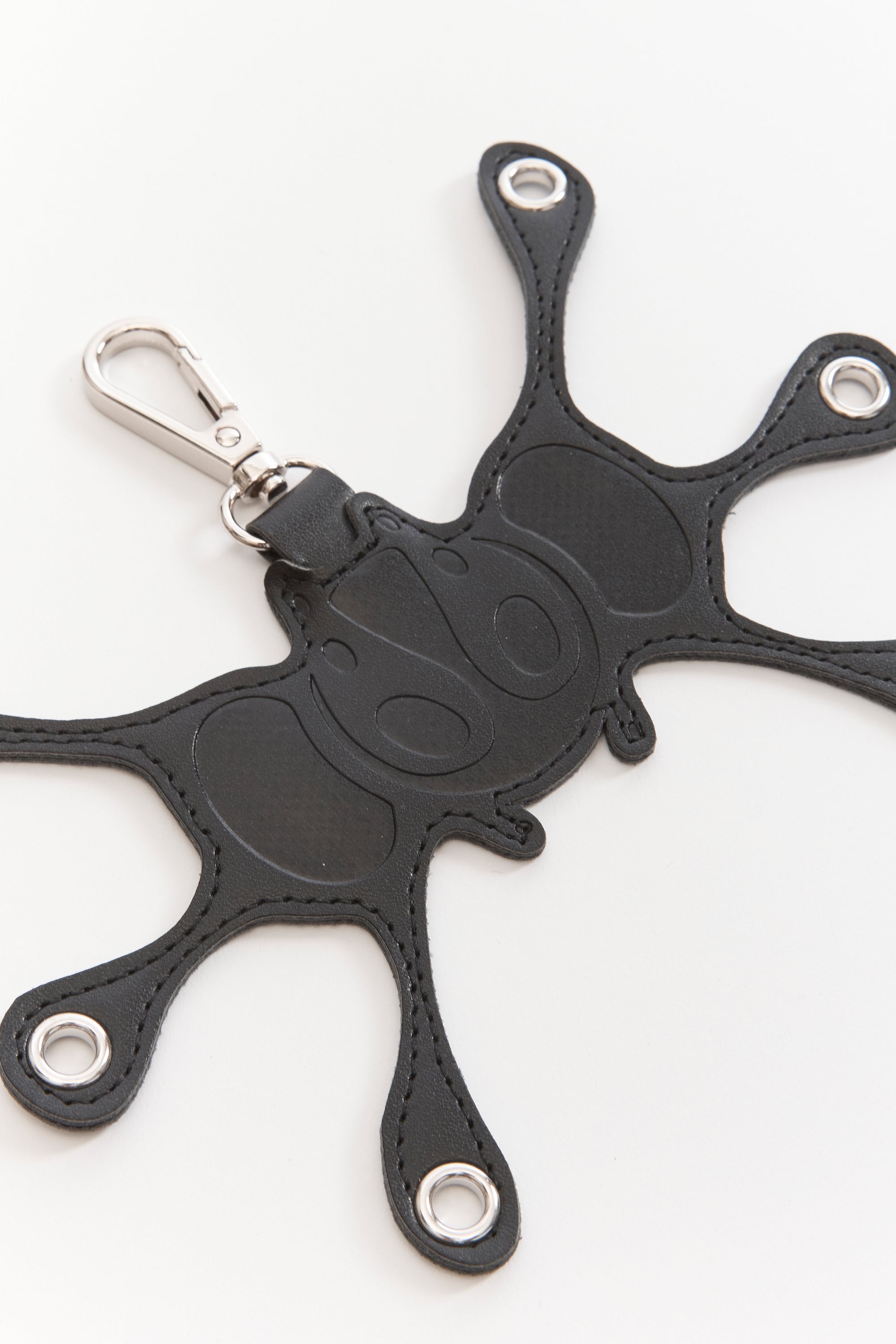The Angel99 Grommet Keychain Black available online with global shipping, and in PAM Stores Melbourne and Sydney.