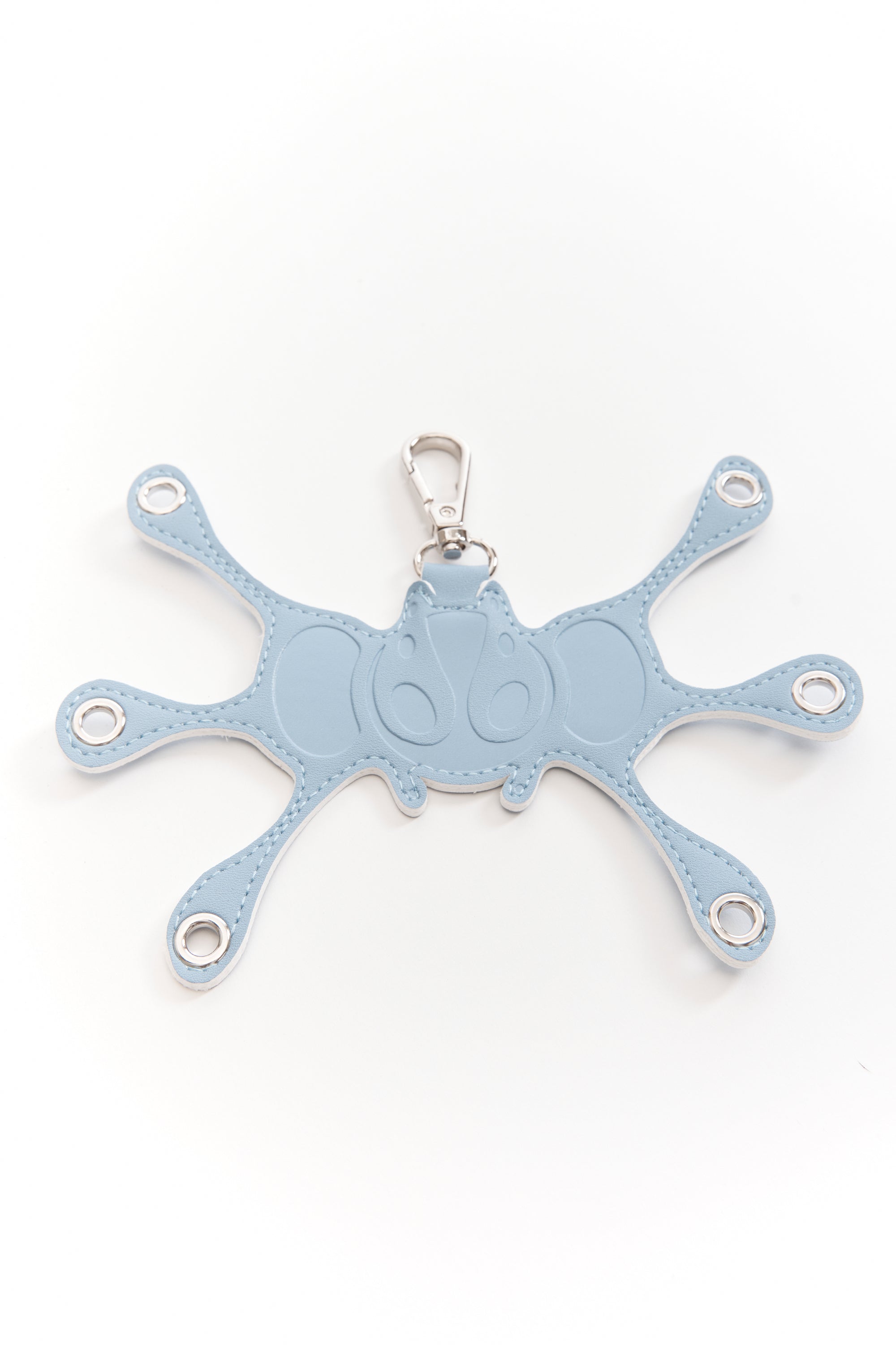 The Angel99 Grommet Keychain Baby Blue available online with global shipping, and in PAM Stores Melbourne and Sydney.