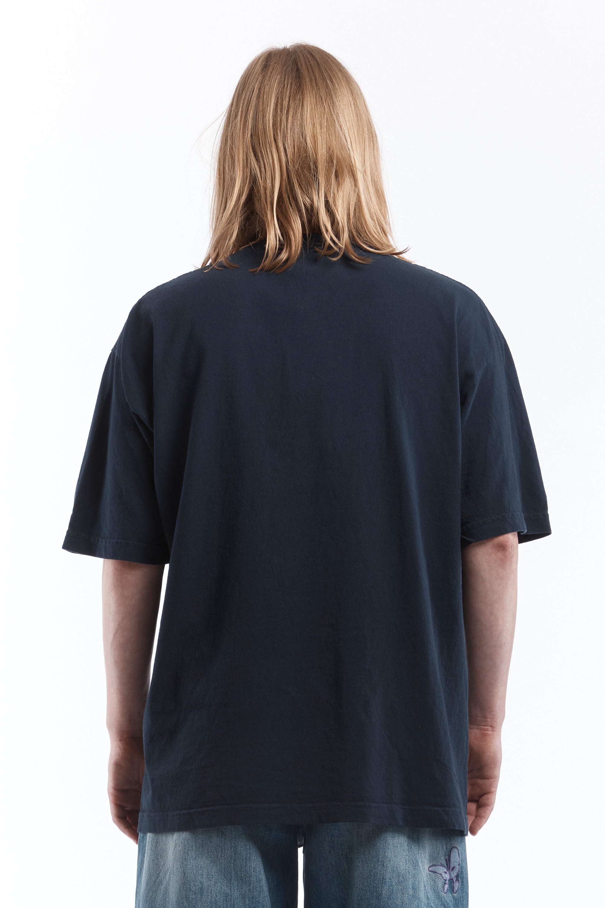 The ULTRA HAPPY TEE NAVY available online with global shipping, and in PAM Stores Melbourne and Sydney.