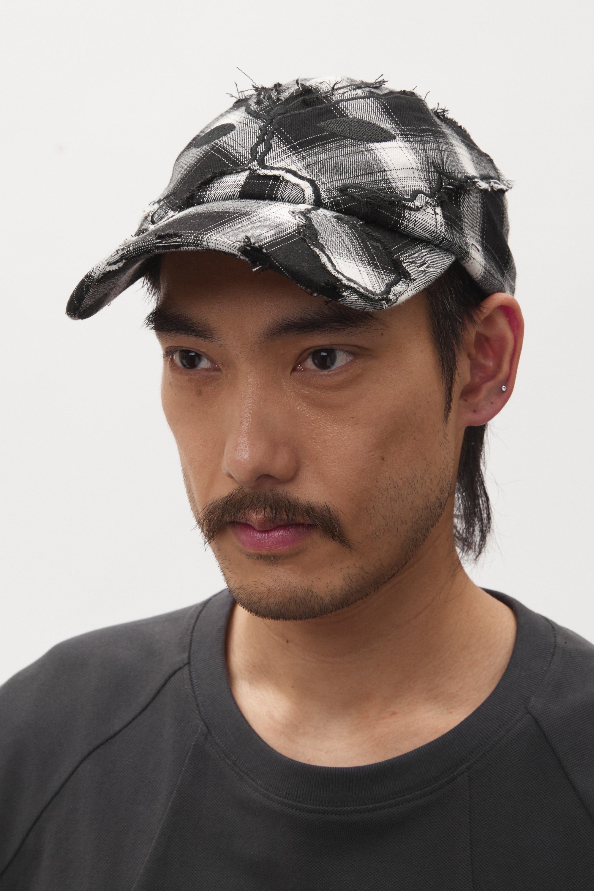 The CHECK ALIEN BUTTERFLY KISS BASEBALL CAP available online with global shipping, and in PAM Stores Melbourne and Sydney.