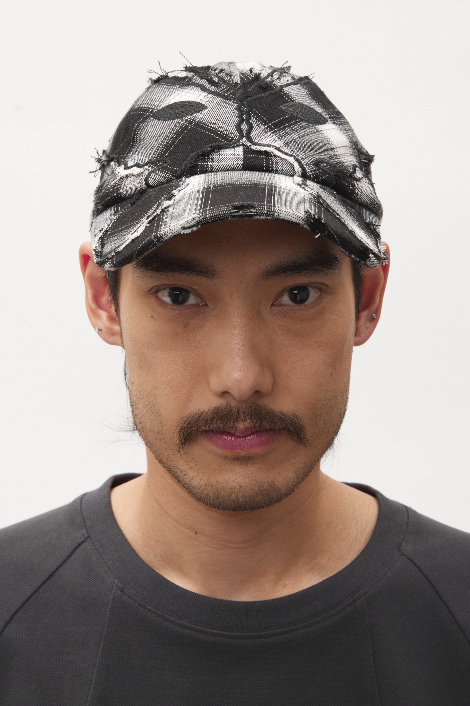 The CHECK ALIEN BUTTERFLY KISS BASEBALL CAP available online with global shipping, and in PAM Stores Melbourne and Sydney.