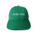 The I WORK HERE CAP available online with global shipping, and in PAM Stores Melbourne and Sydney.