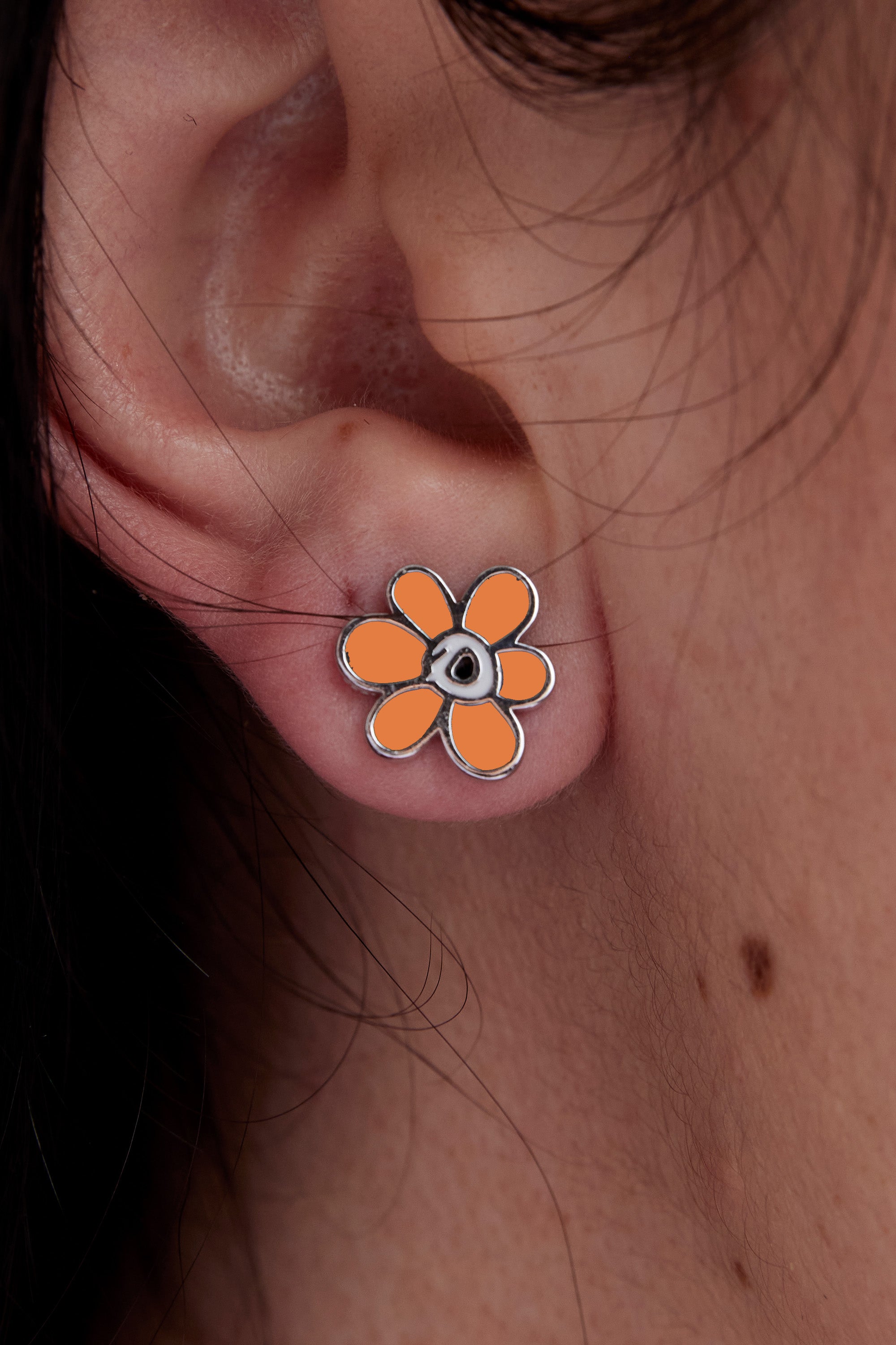 The LUNACY GESTURE STUD available online with global shipping, and in PAM Stores Melbourne and Sydney.