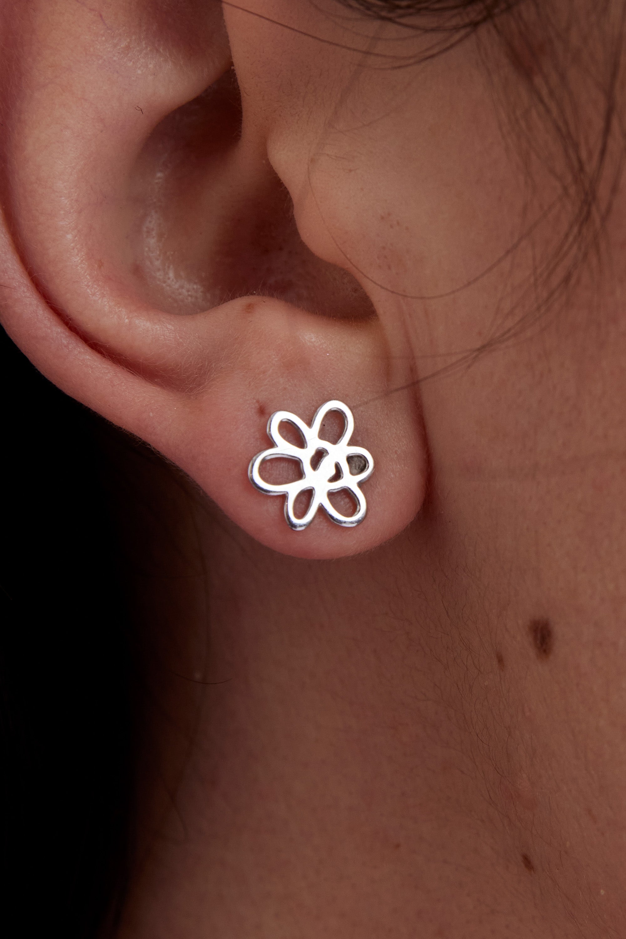The OUTLINE GESTURE STUD - SILVER available online with global shipping, and in PAM Stores Melbourne and Sydney.