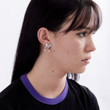 The PEARL DROP ALIEN KISS EARRING available online with global shipping, and in PAM Stores Melbourne and Sydney.