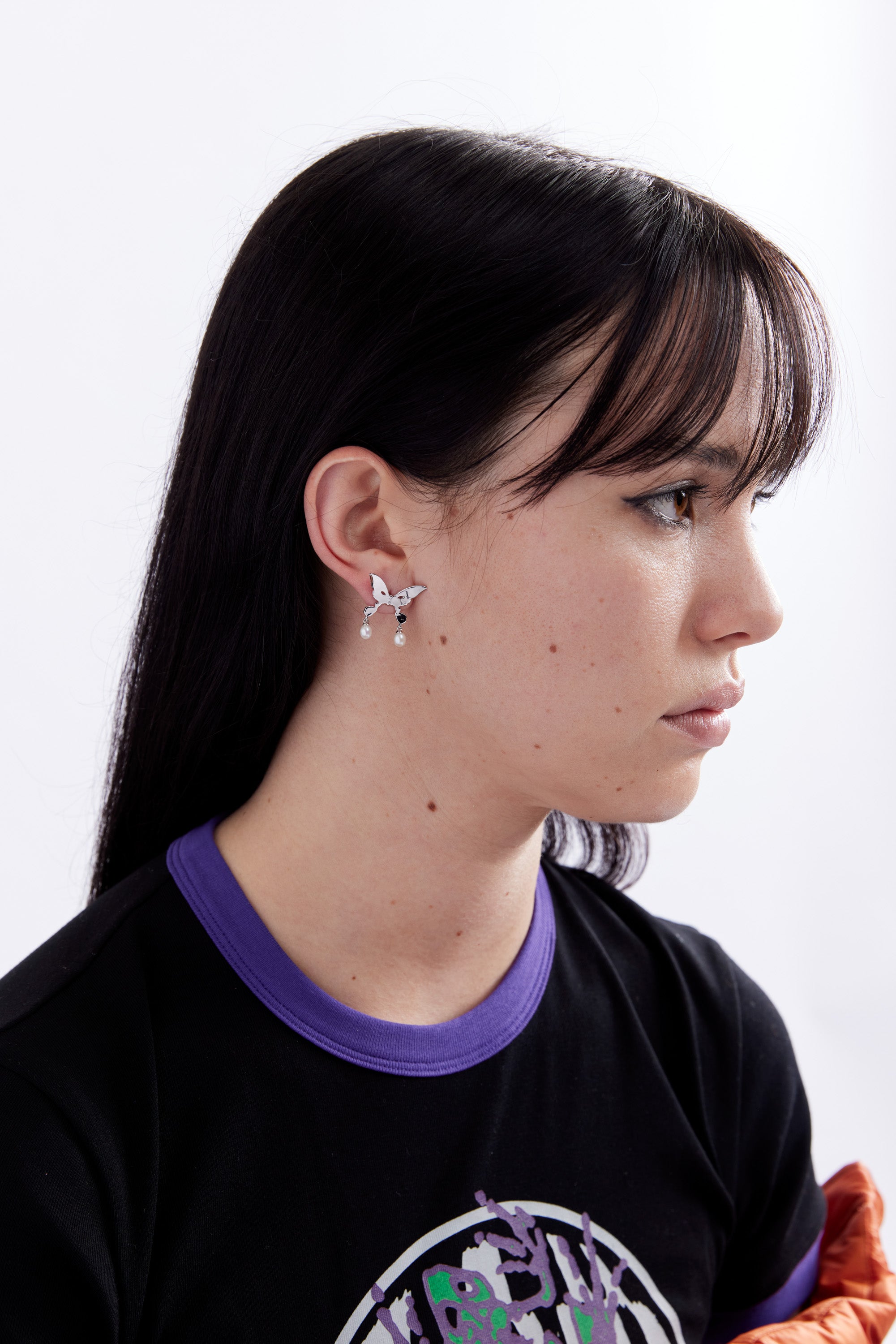 The PEARL DROP ALIEN KISS EARRING available online with global shipping, and in PAM Stores Melbourne and Sydney.