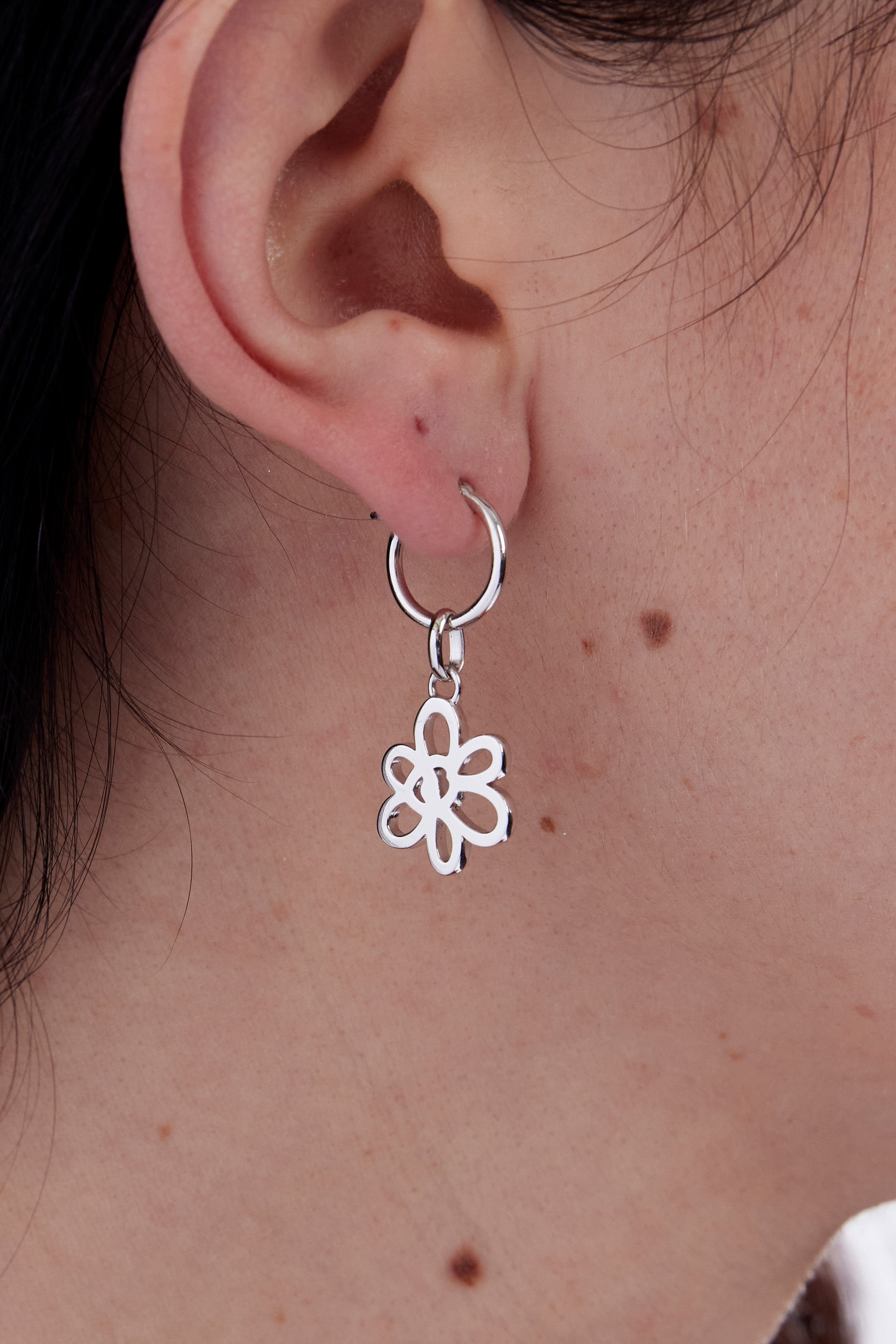 The OUTLINE GESTURE EARRING - SILVER available online with global shipping, and in PAM Stores Melbourne and Sydney.