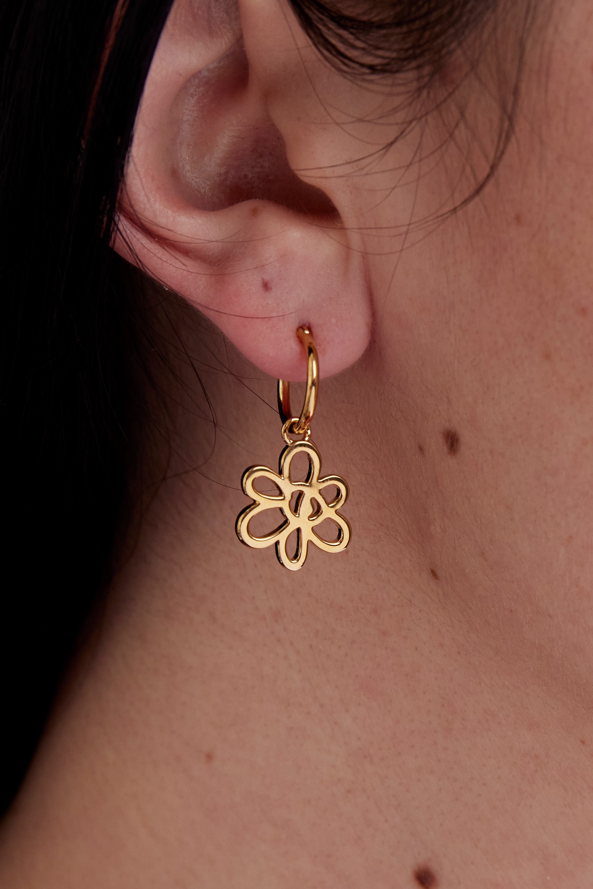 The OUTLINE GESTURE EARRING - GOLD available online with global shipping, and in PAM Stores Melbourne and Sydney.