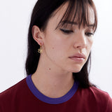 The OUTLINE GESTURE EARRING - GOLD available online with global shipping, and in PAM Stores Melbourne and Sydney.