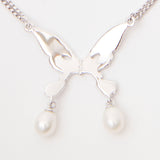The PEARL DROP ALIEN KISS NECKLACE available online with global shipping, and in PAM Stores Melbourne and Sydney.