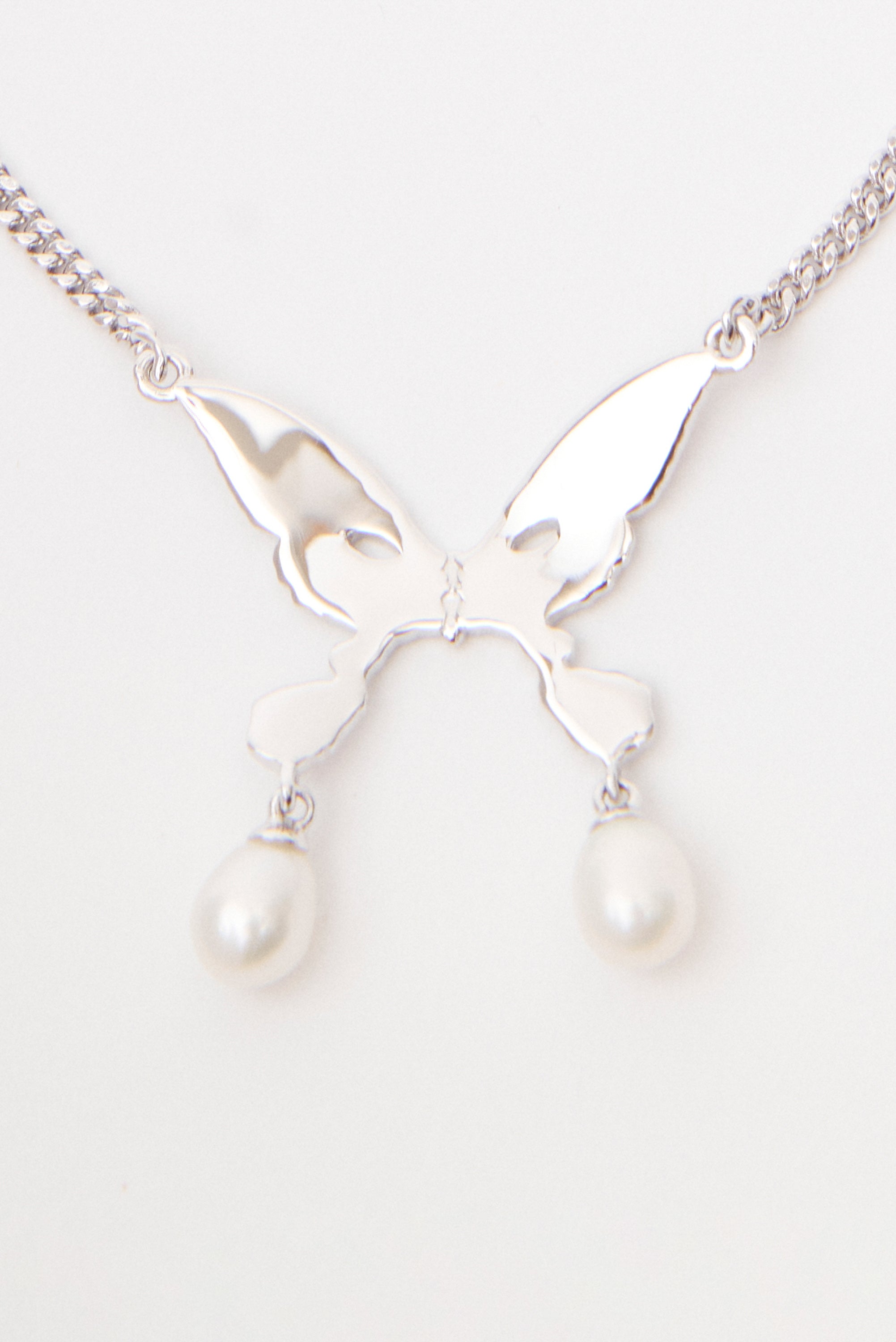 The PEARL DROP ALIEN KISS NECKLACE available online with global shipping, and in PAM Stores Melbourne and Sydney.