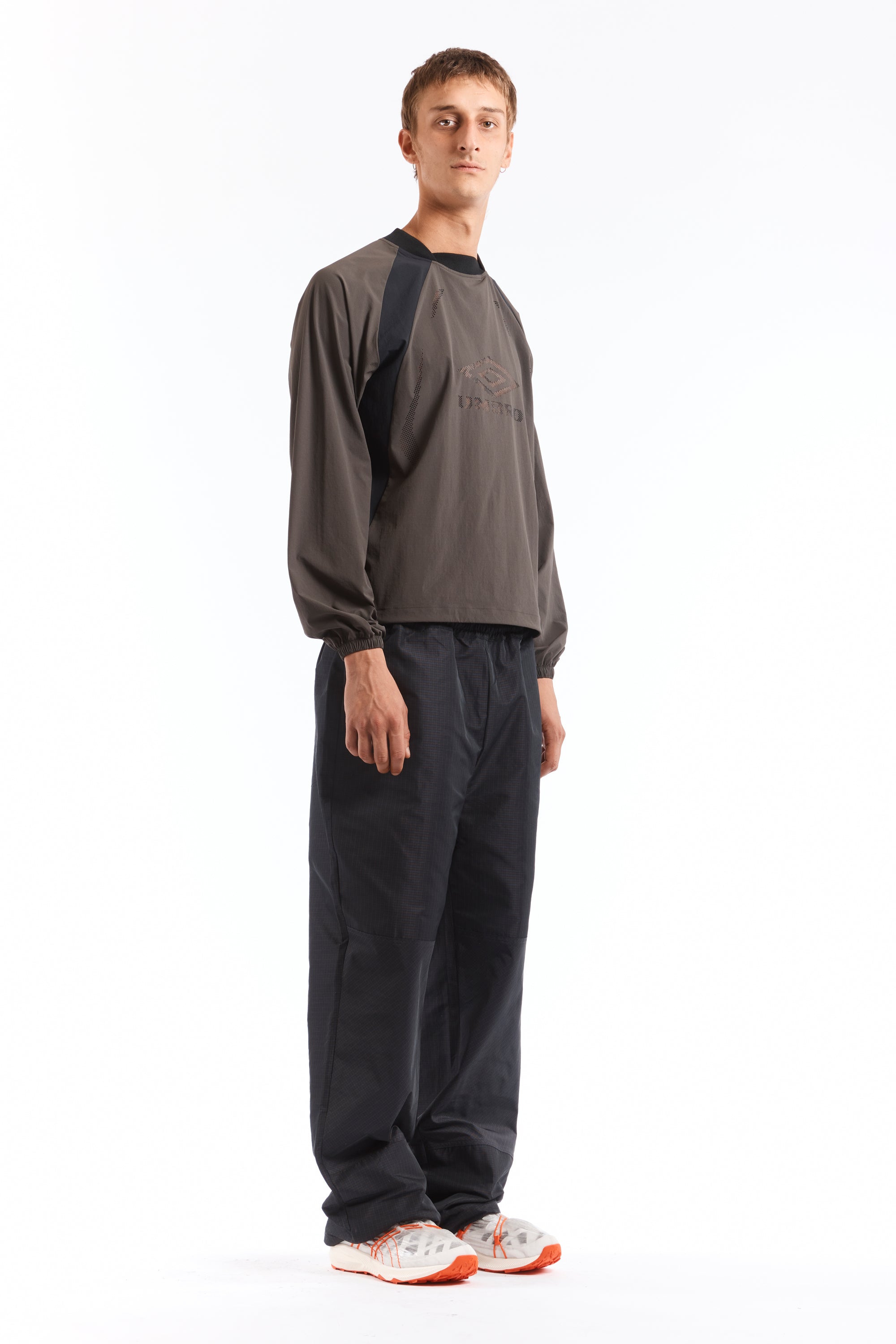 The Check Track Pants Navy Dark Brown available online with global shipping, and in PAM Stores Melbourne and Sydney.