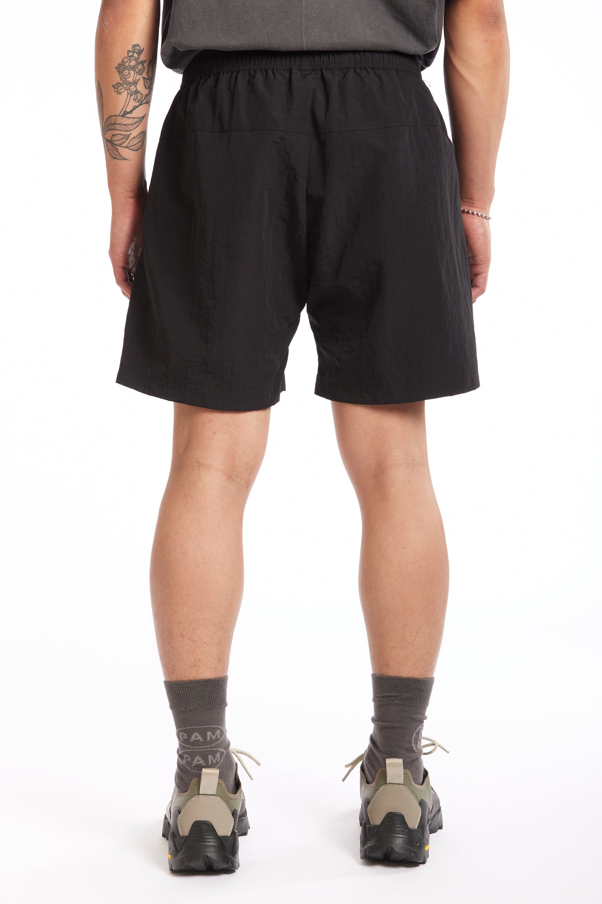 The LUNACY FREE WHEELING TRACK SHORTS - BLACK available online with global shipping, and in PAM Stores Melbourne and Sydney.