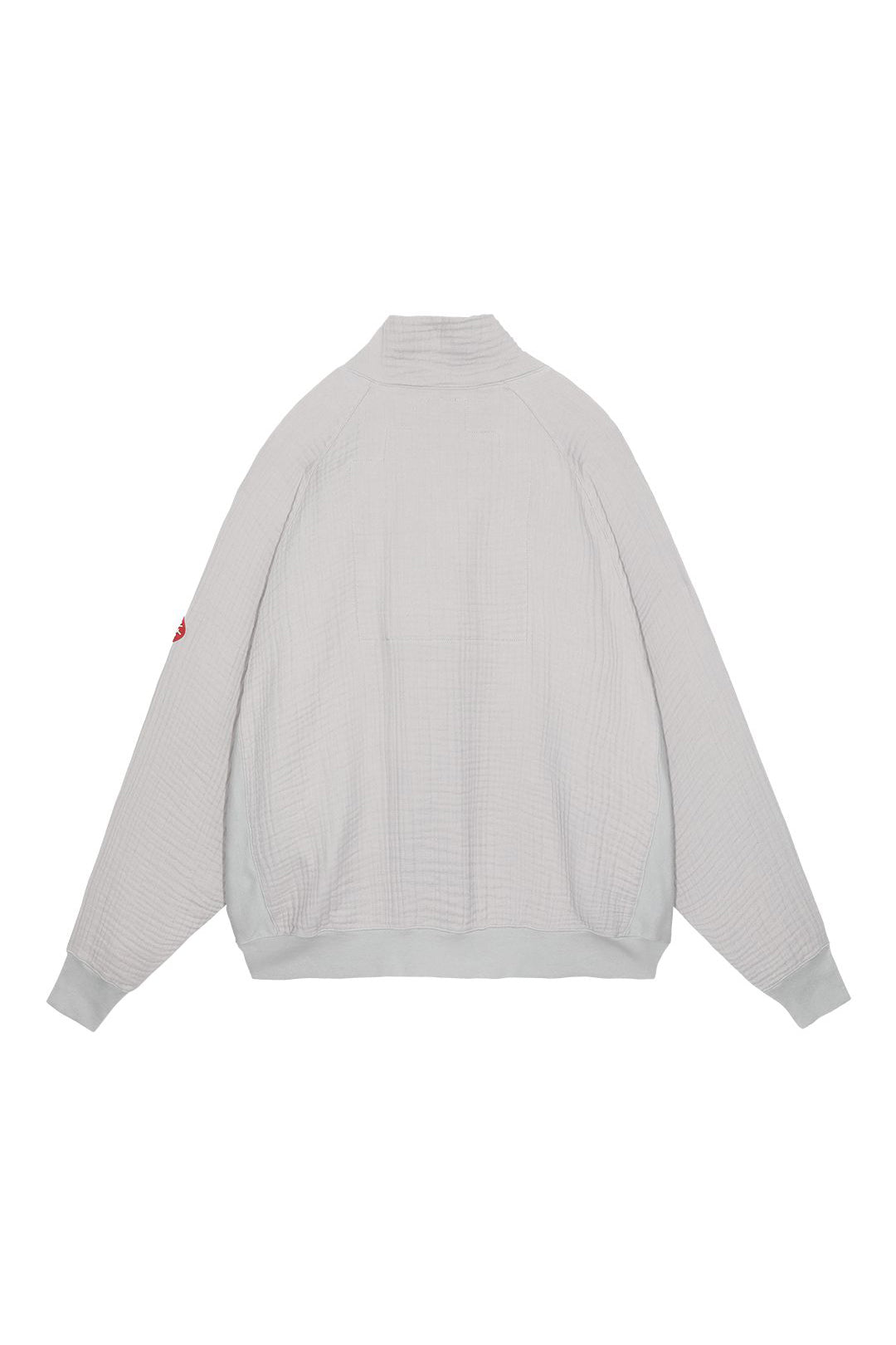 The LAYERED GAUZE HALF ZIP available online with global shipping, and in PAM Stores Melbourne and Sydney.