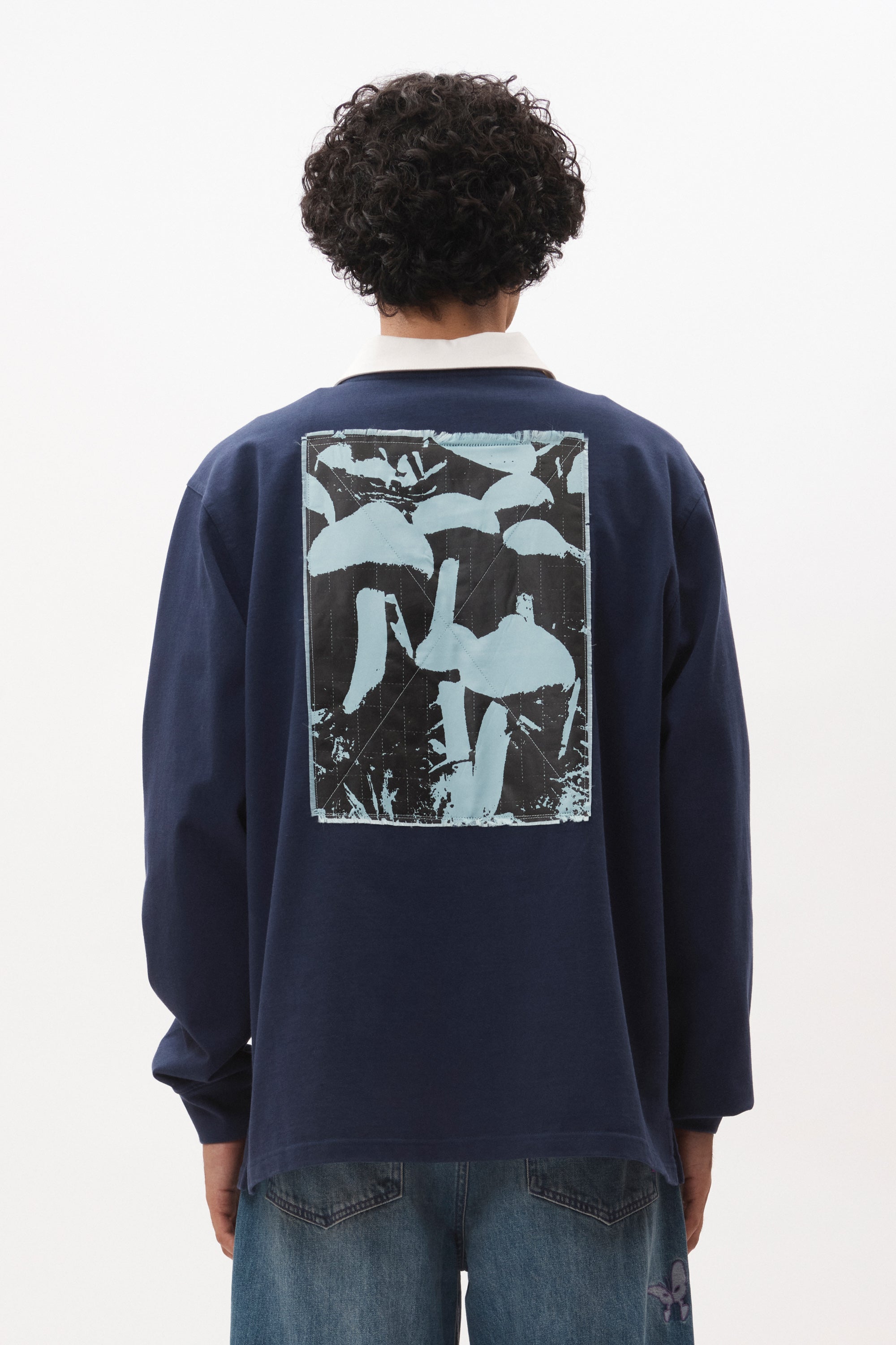 The HOWL HALF ZIP RUGBY TOP available online with global shipping, and in PAM Stores Melbourne and Sydney.
