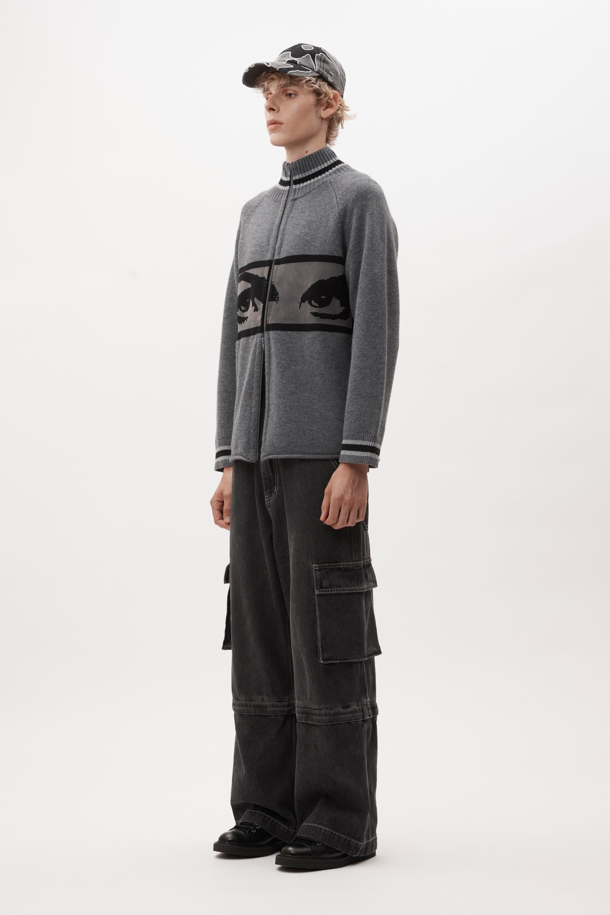 The EYES ZIP THRU KNIT CARDIGAN available online with global shipping, and in PAM Stores Melbourne and Sydney.