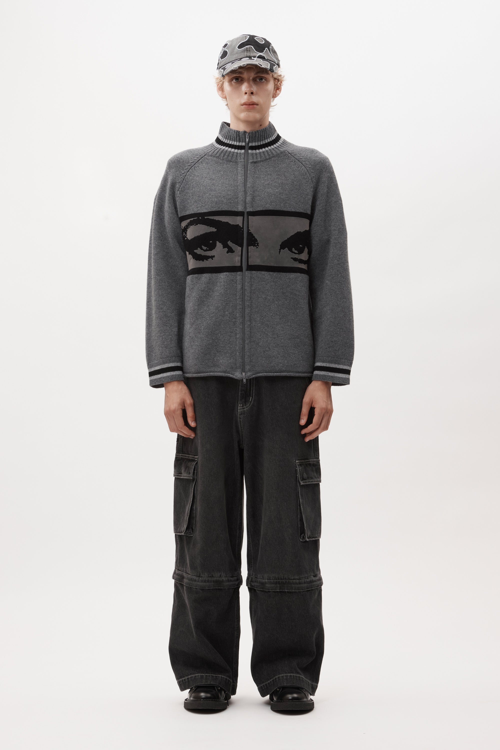 The EYES ZIP THRU KNIT CARDIGAN available online with global shipping, and in PAM Stores Melbourne and Sydney.