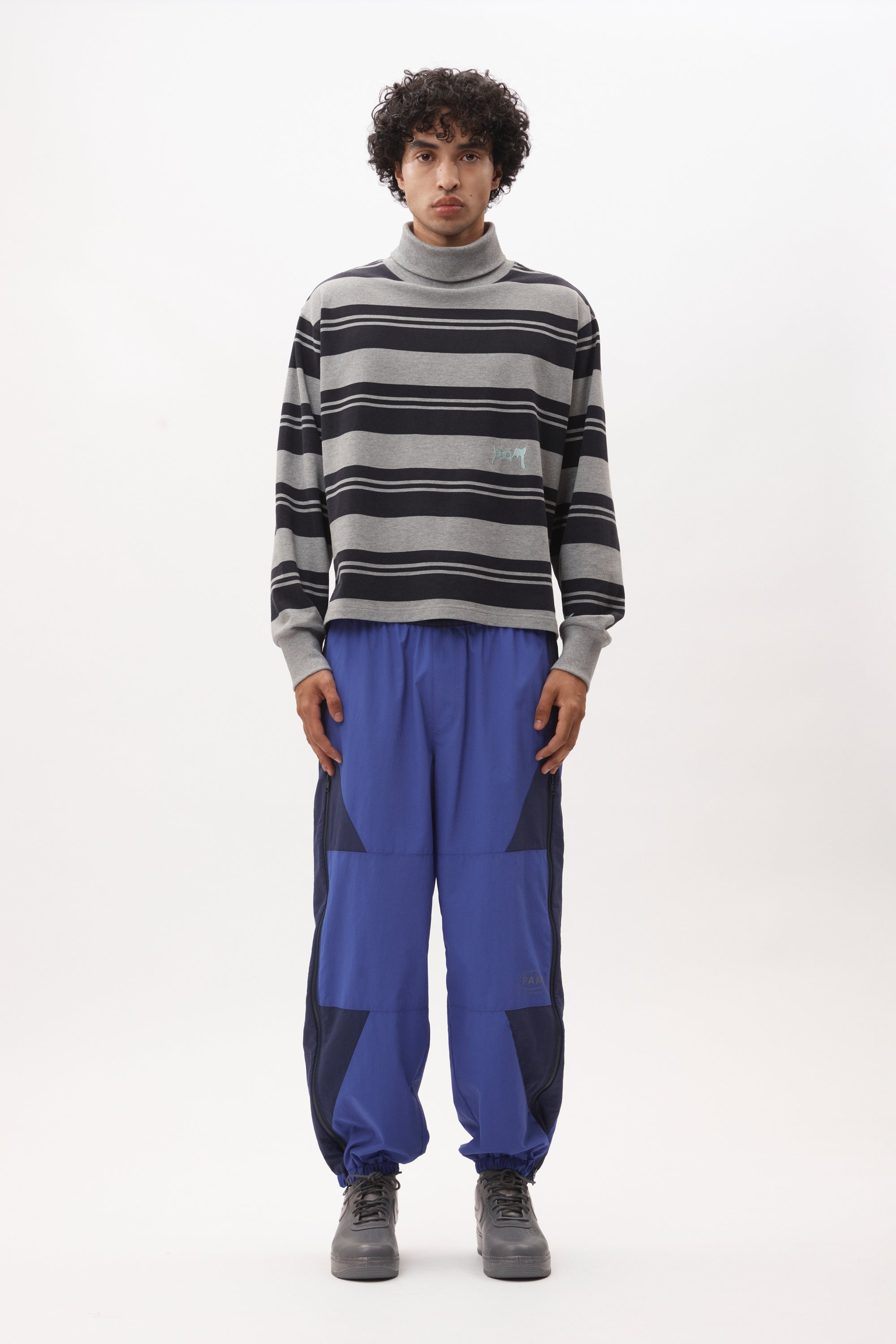 The AKTIV-8 TRACKPANT - BLUES available online with global shipping, and in PAM Stores Melbourne and Sydney.