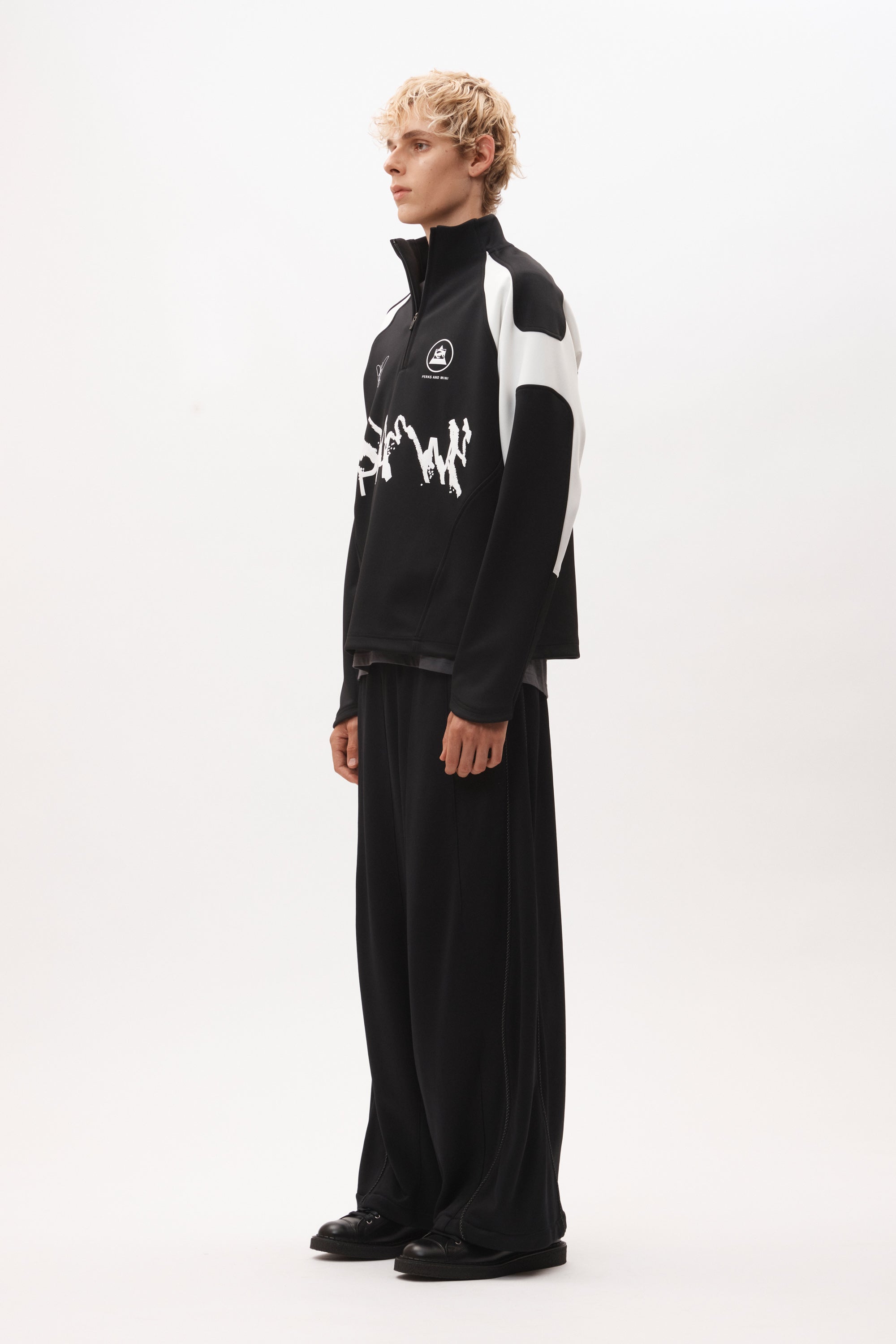 The ANGEL PULLOVER - BLACK WHITE available online with global shipping, and in PAM Stores Melbourne and Sydney.