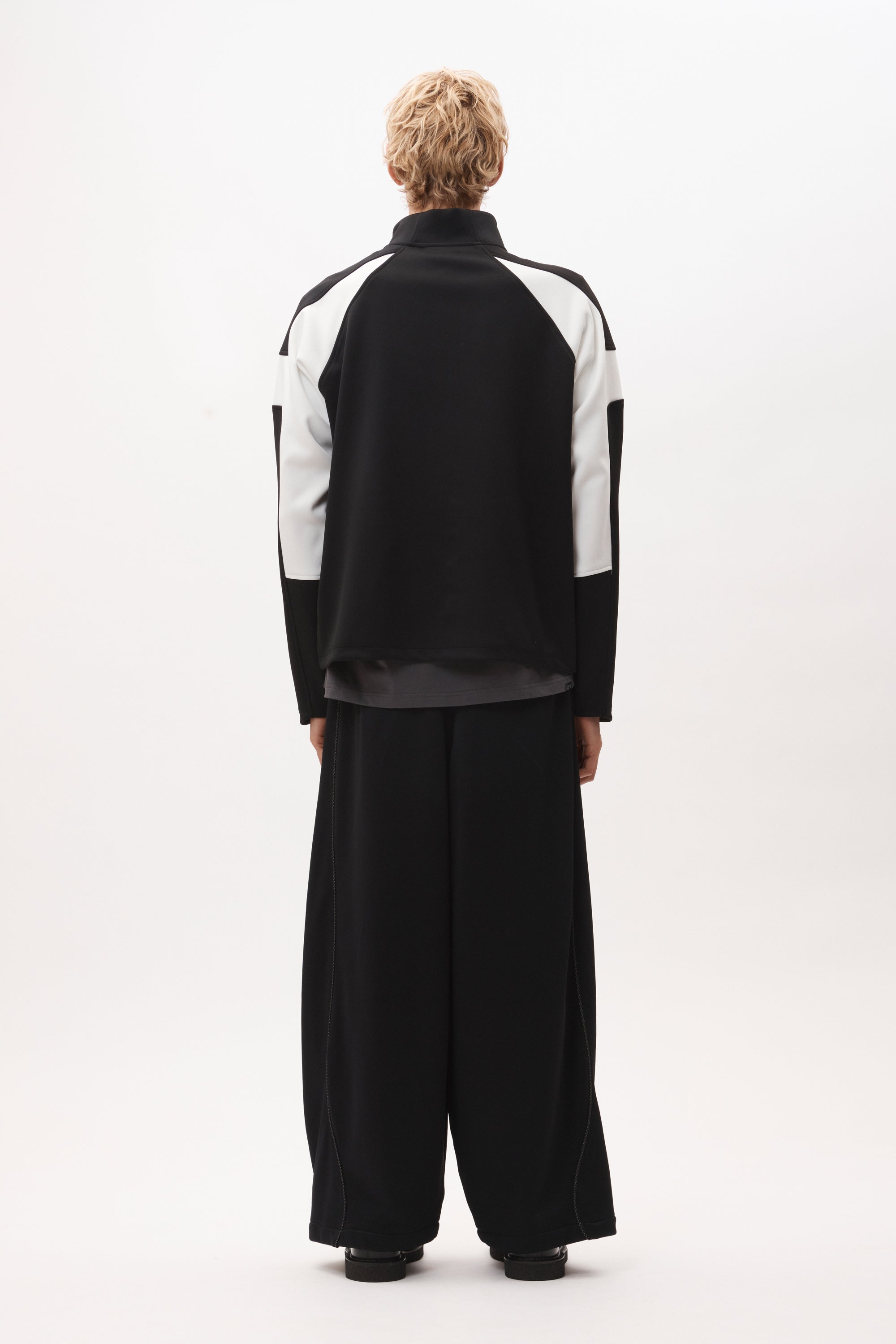 The ANGEL PULLOVER - BLACK WHITE available online with global shipping, and in PAM Stores Melbourne and Sydney.