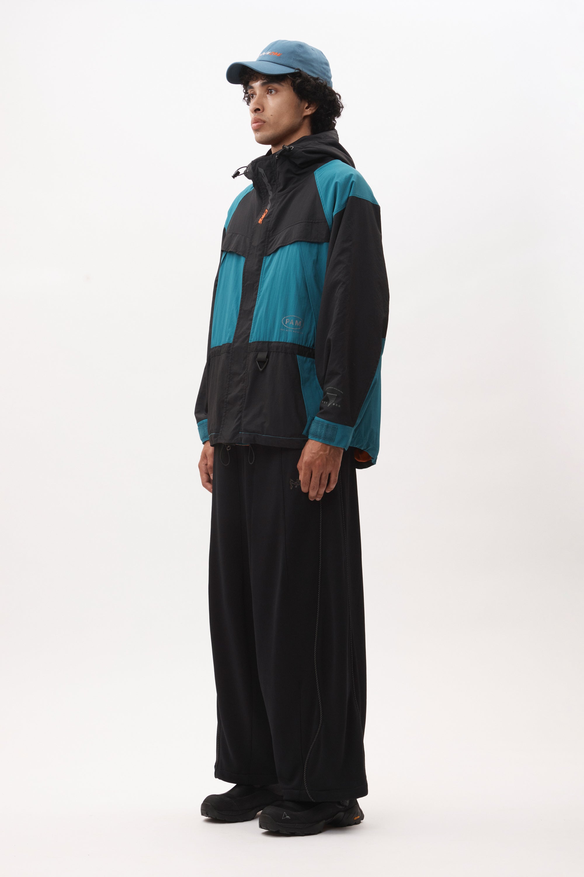 The AUROVILLE SAILING JACKET - BLACK TEAL available online with global shipping, and in PAM Stores Melbourne and Sydney.