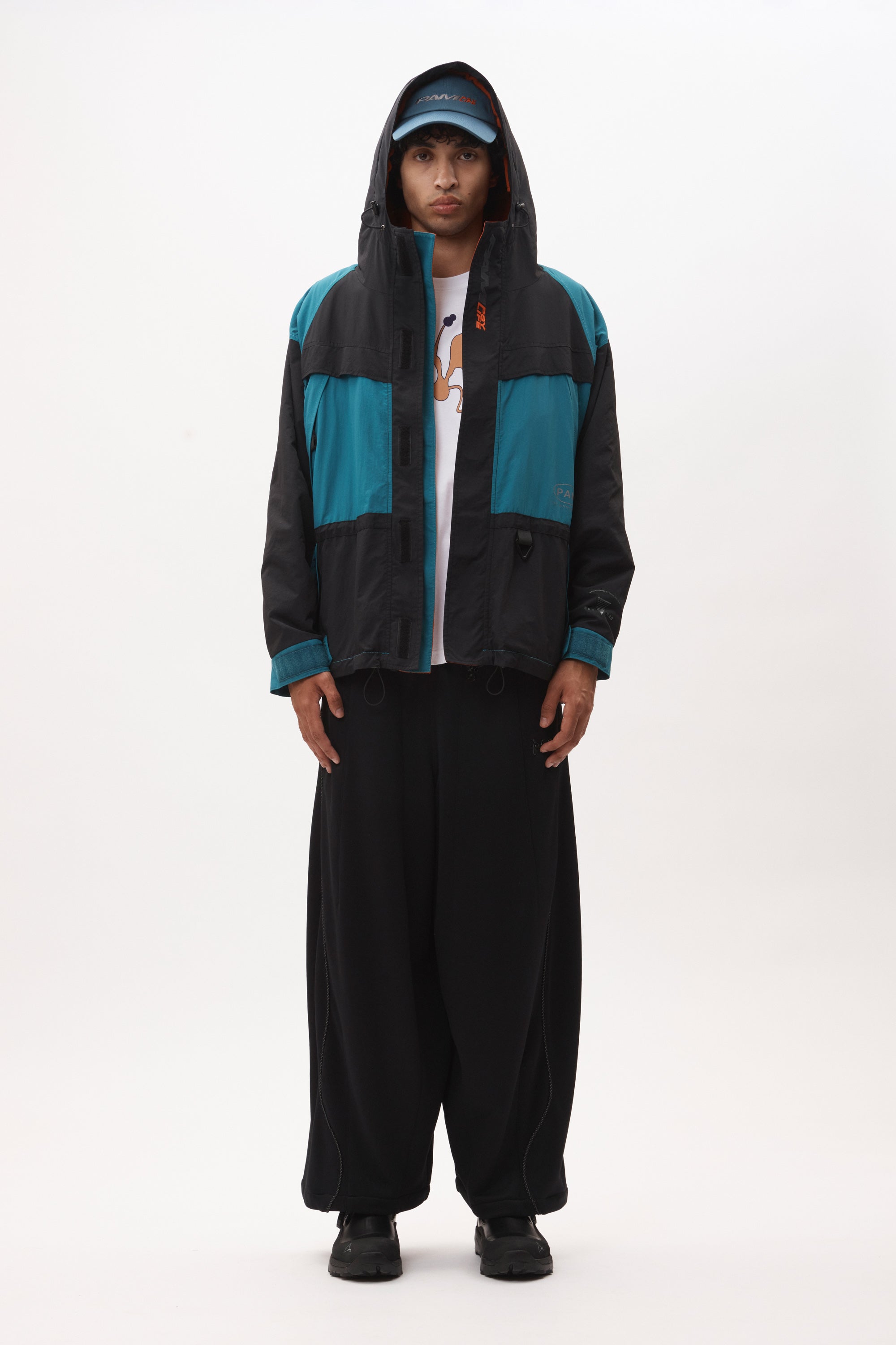 The AUROVILLE SAILING JACKET - BLACK TEAL available online with global shipping, and in PAM Stores Melbourne and Sydney.