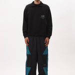 The AKTIV-8 TRACKPANT - BLACK TEAL available online with global shipping, and in PAM Stores Melbourne and Sydney.