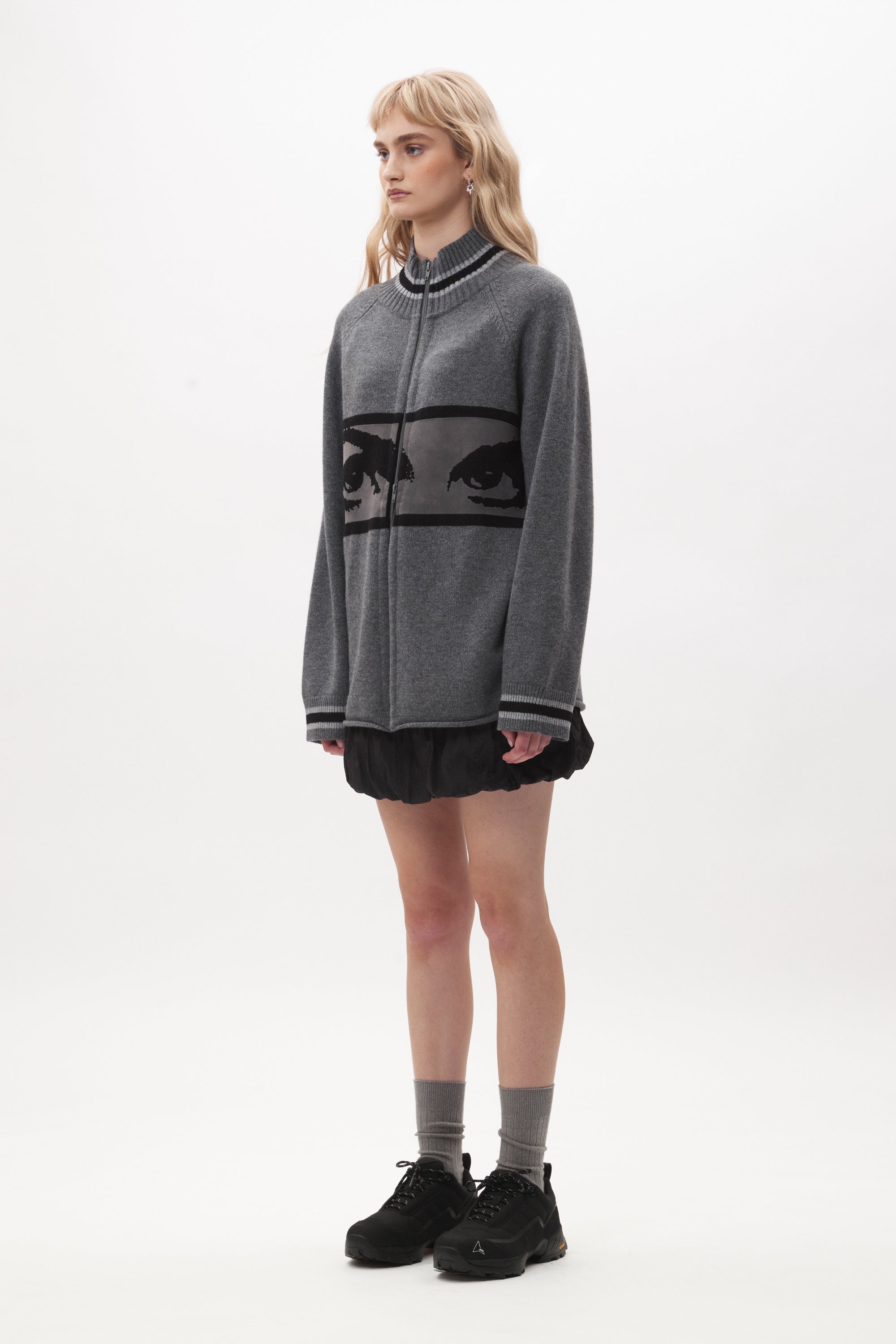 The EYES ZIP THRU KNIT CARDIGAN available online with global shipping, and in PAM Stores Melbourne and Sydney.