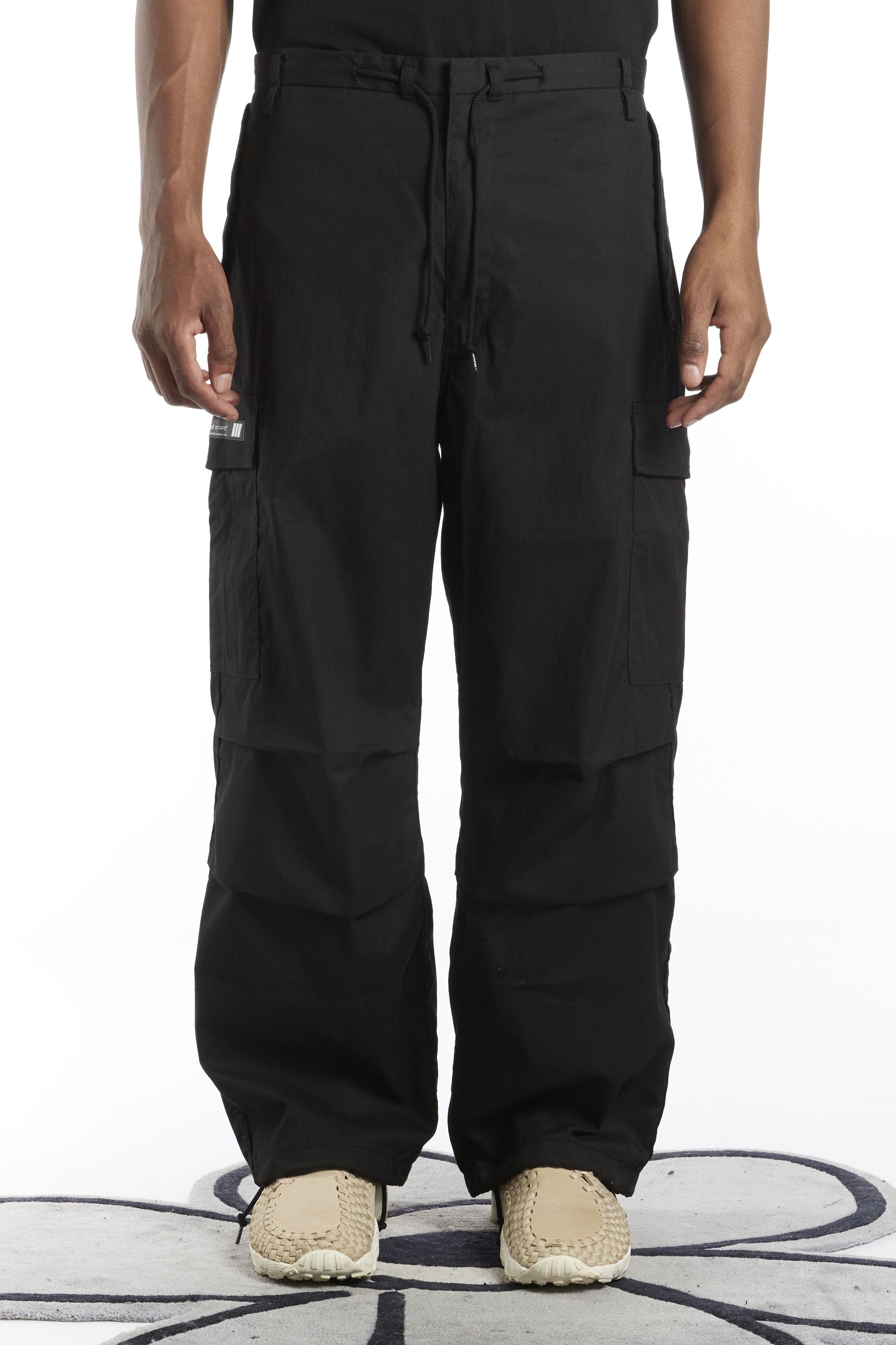The WTAPS - MILT001 OXFORD TROUSERS BLACK available online with global shipping, and in PAM Stores Melbourne and Sydney.