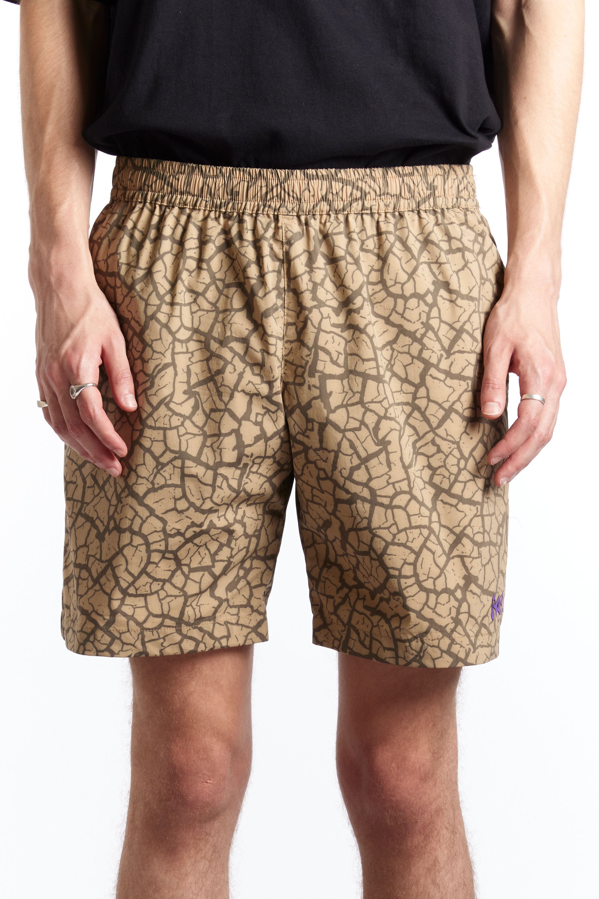 The MUDCRACK SWIM SHORTS  available online with global shipping, and in PAM Stores Melbourne and Sydney.